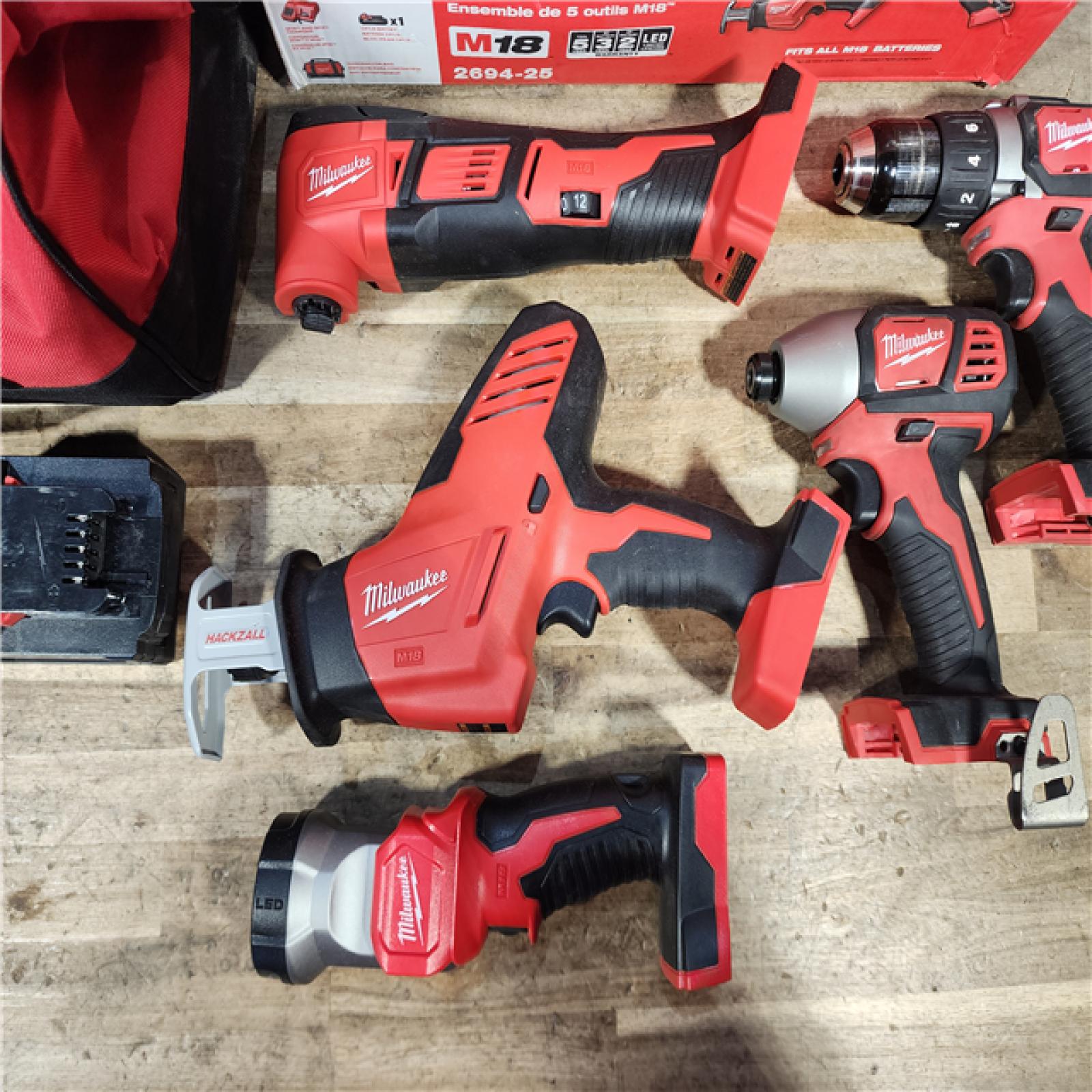 HOUSTON LOCATION - AS-IS M18 18V Lithium-Ion Cordless Combo Kit (5-Tool) with (2) Batteries  Charger and Tool Bag