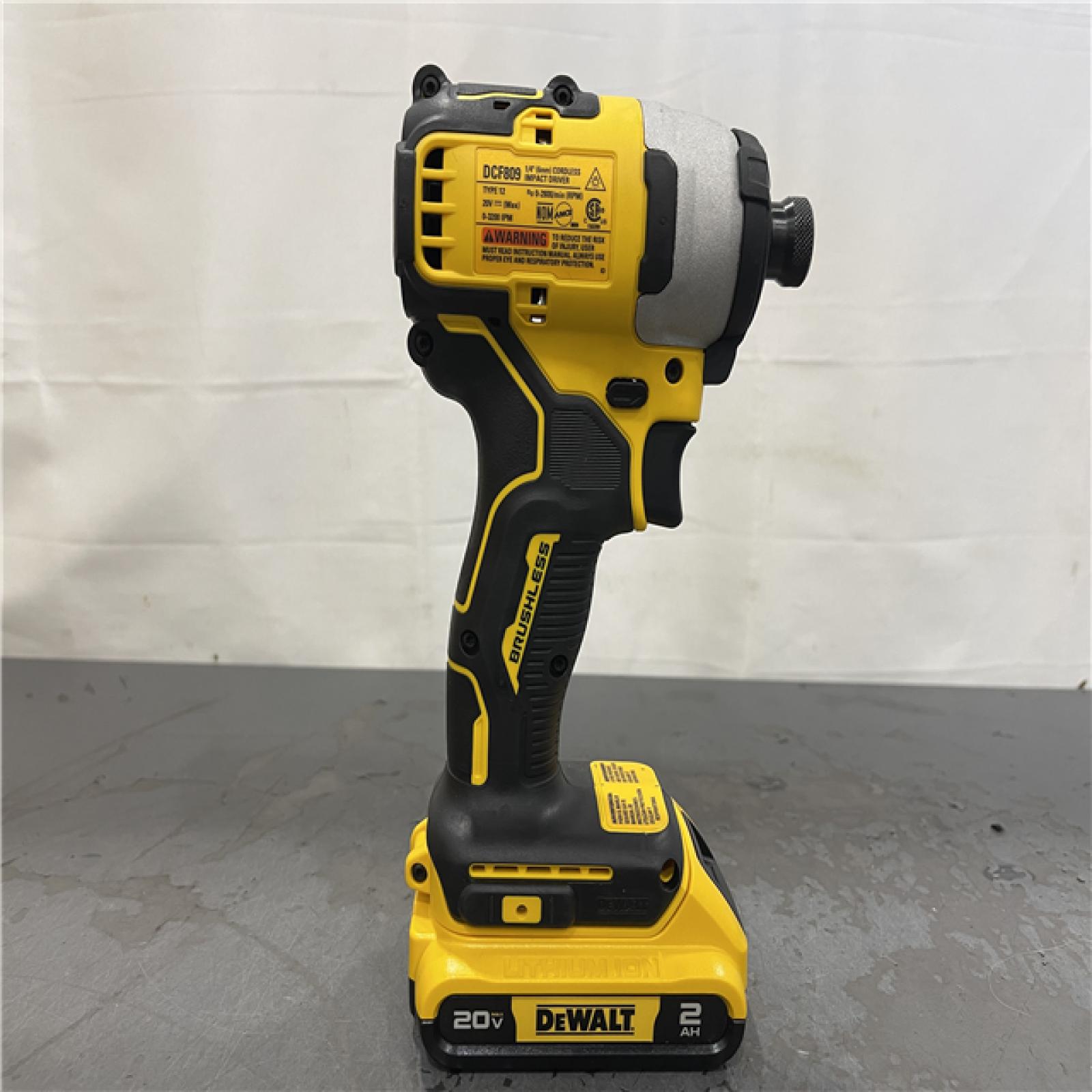 AS-IS- DeWALT ATOMIC 20V MAX Cordless Compact Impact Driver Kit W/ Li-Ion 2ah Battery  1/4  Brushless