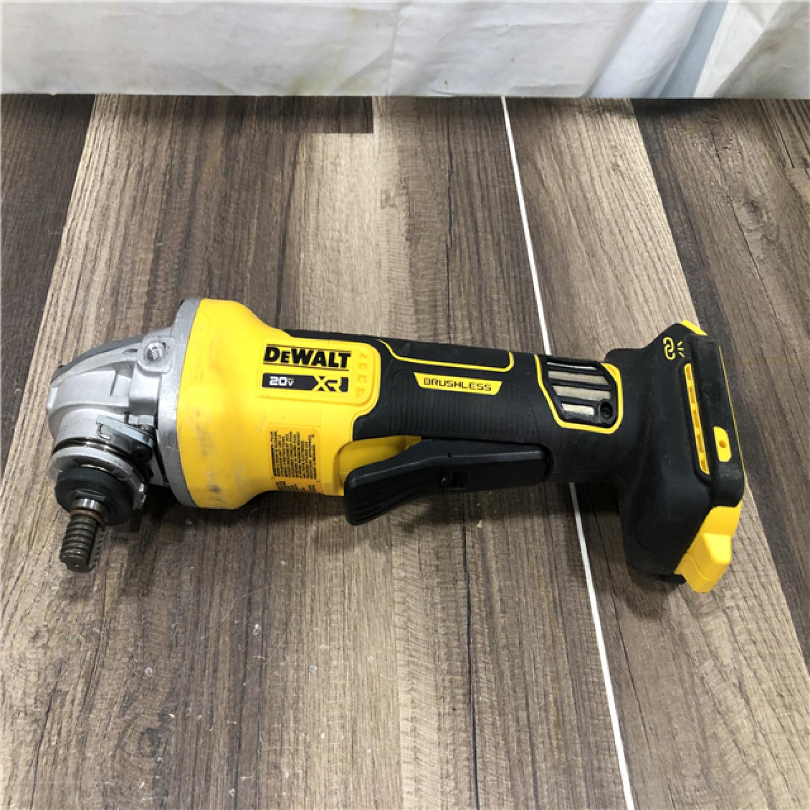 AS-IS  DEWALT 20V XR Cordless 4-1/2. in. to 5 in. Variable Speed Angle Grinder (Tool Only)