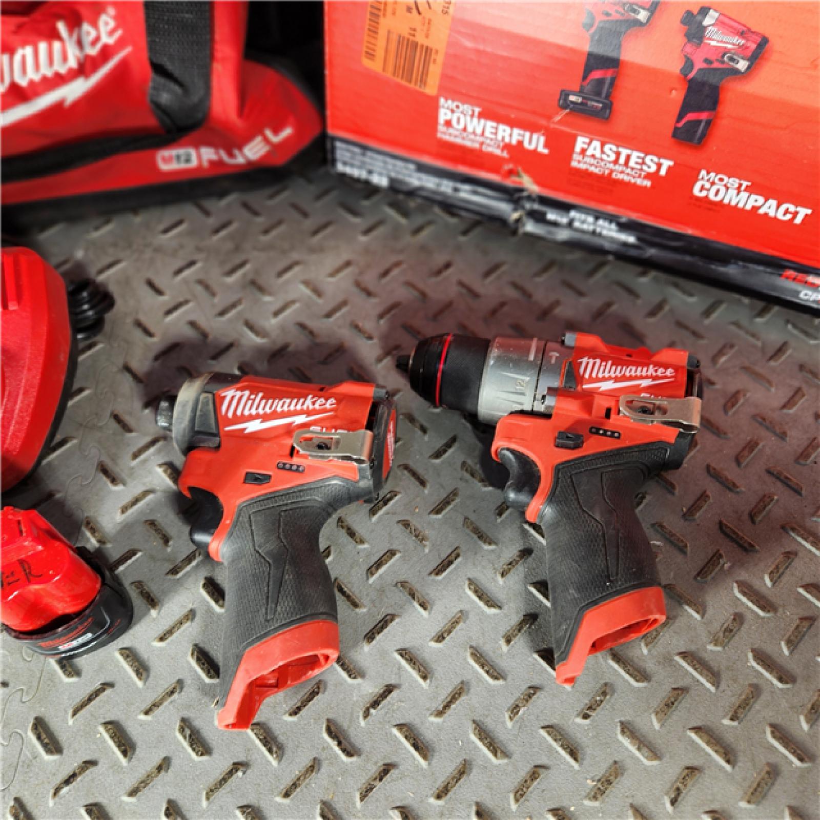 Houston Location - As-IS Milwaukee 3497-22 12V Brushless Hammer Drill and Impact Driver Combo Kit - Appears IN LIKE NEW Condition