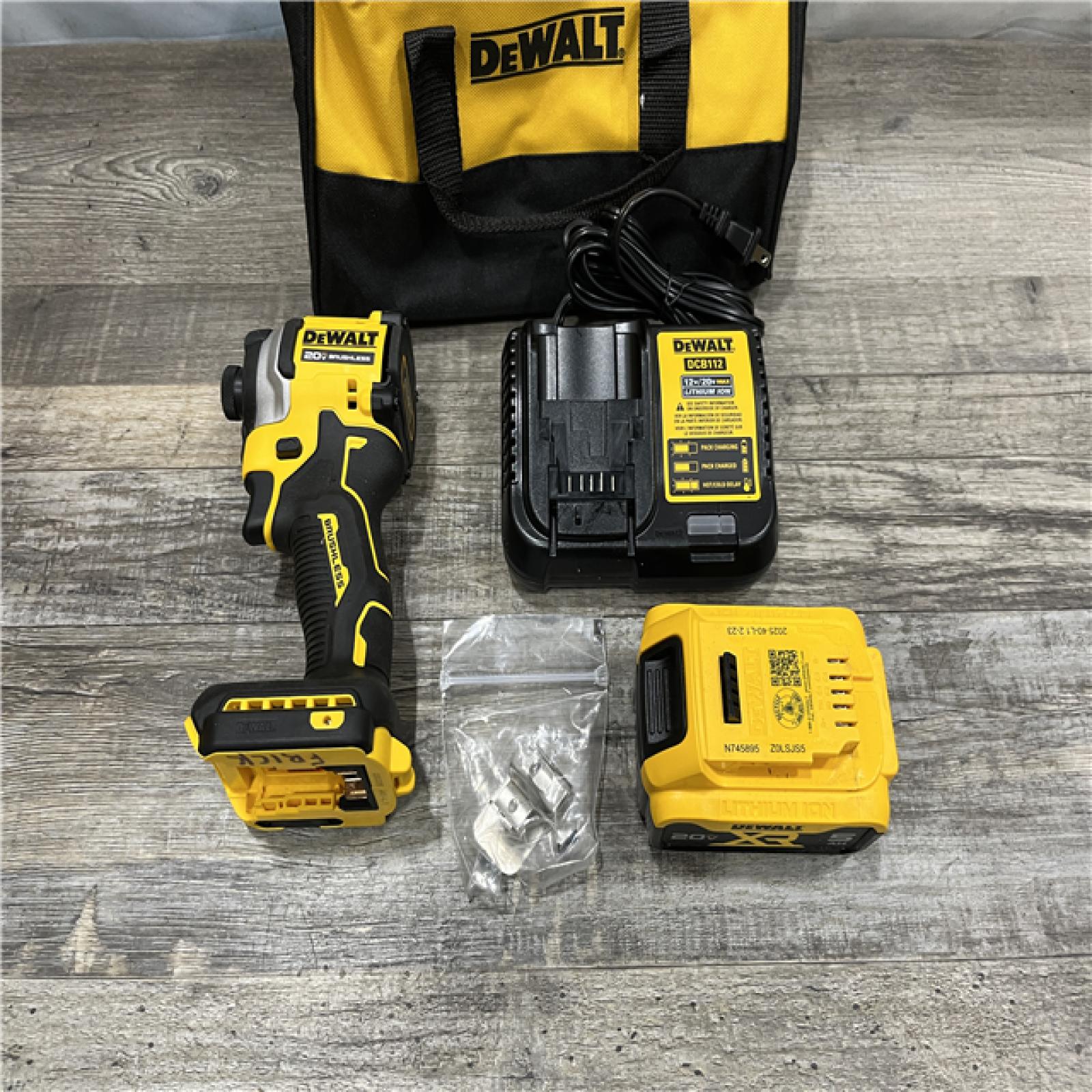 AS-IS DEWALT ATOMIC 20V MAX Lithium-Ion Cordless 1/4 in. Brushless Impact Driver Kit