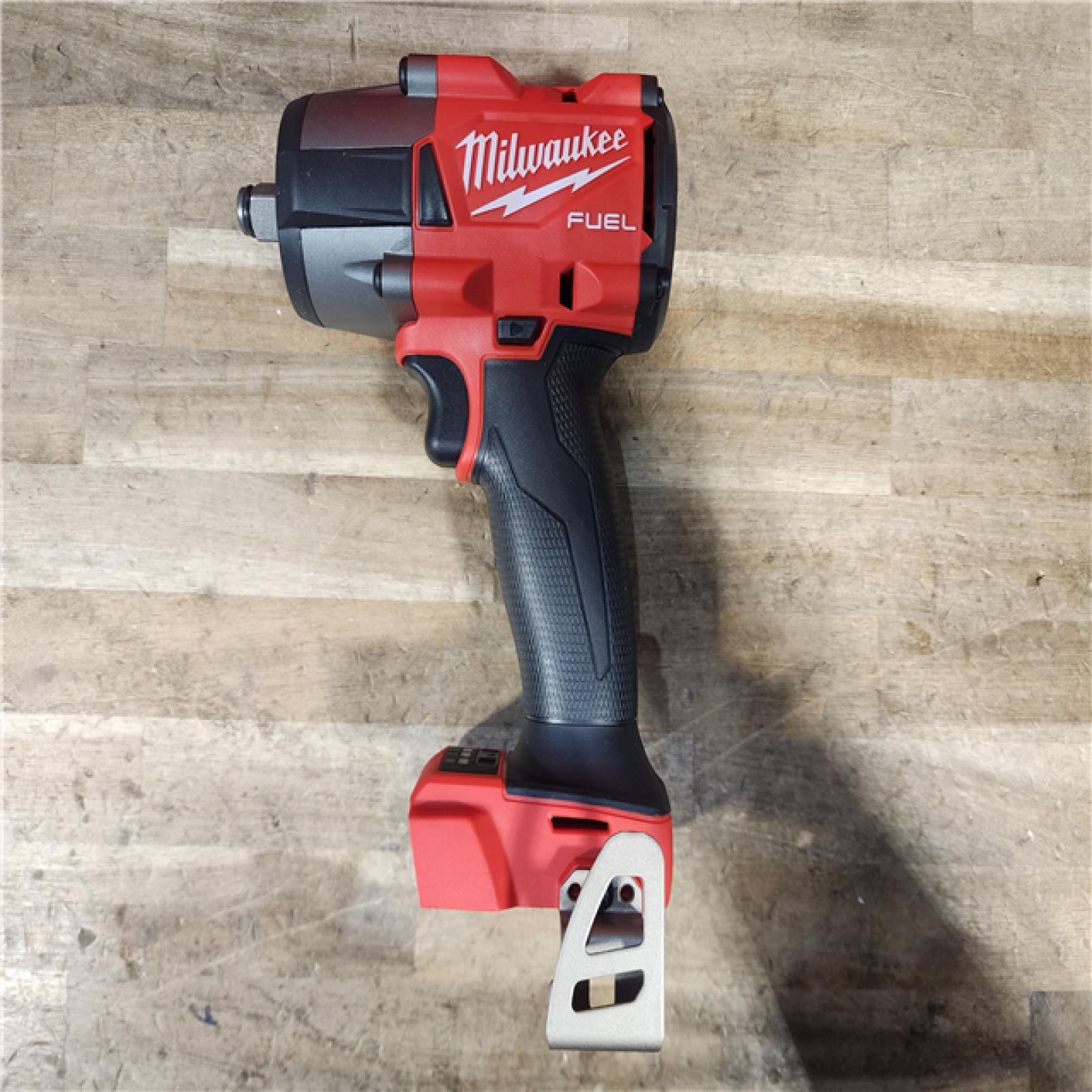 HOUSTON LOCATION - AS-IS Milwaukee M18 18V Fuel 1/2  Mid-Torque Impact Wrench Cordless Lithium-Ion Brushless with Friction Ring 2962-20 (TOOL ONLY)