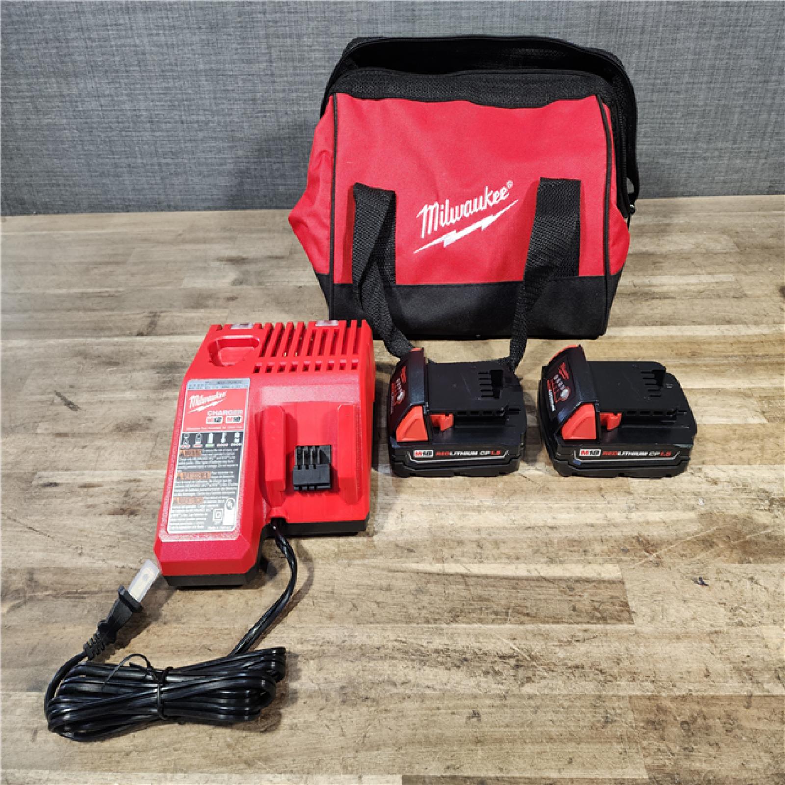 HOUSTON LOCATION - AS-IS Milwaukee  18V Lithium-Ion Cordless Drill Driver/Impact Driver Combo Kit
