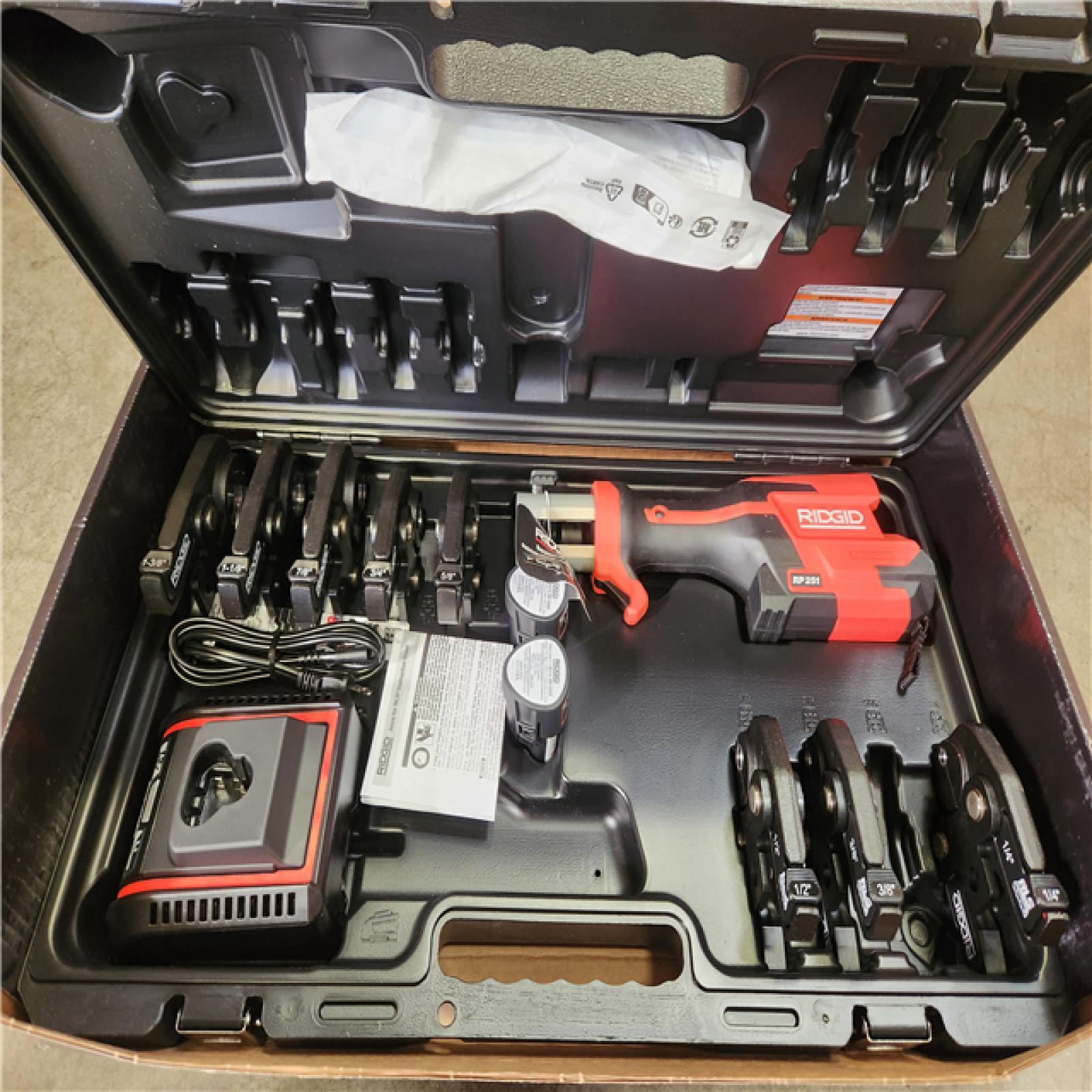 Phoenix NEW RIDGID RP 251 Stainless Steel Press Tool Kit Includes 8-RLS Jaws (1/4 in. - 1-3/8 in.)  2-12V Batteries  Charger Plus Case