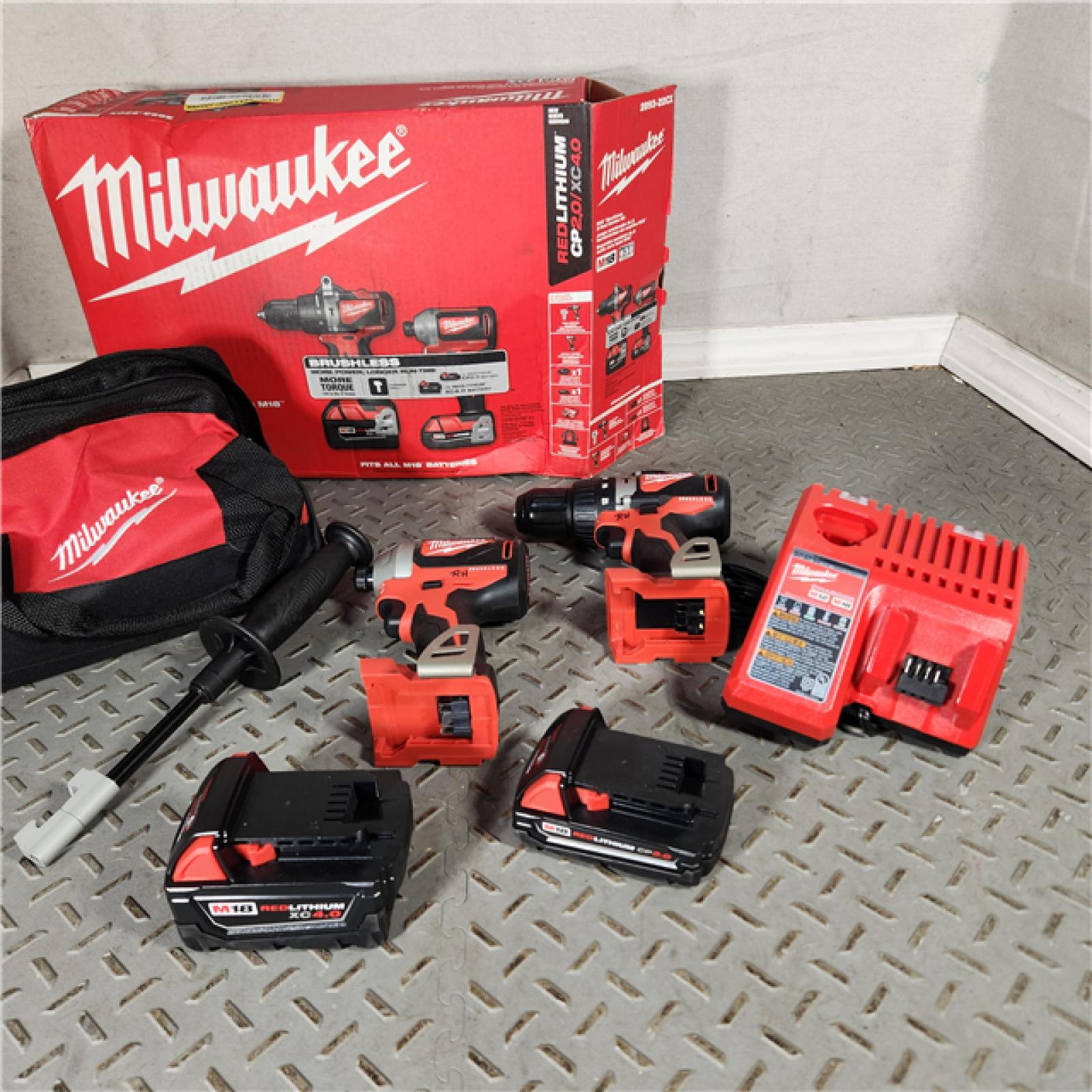 Houston location- AS-IS Milwaukee M18 Brushless 18V Lithium-Ion Drill/Impact Combo Kit with Case and Charger