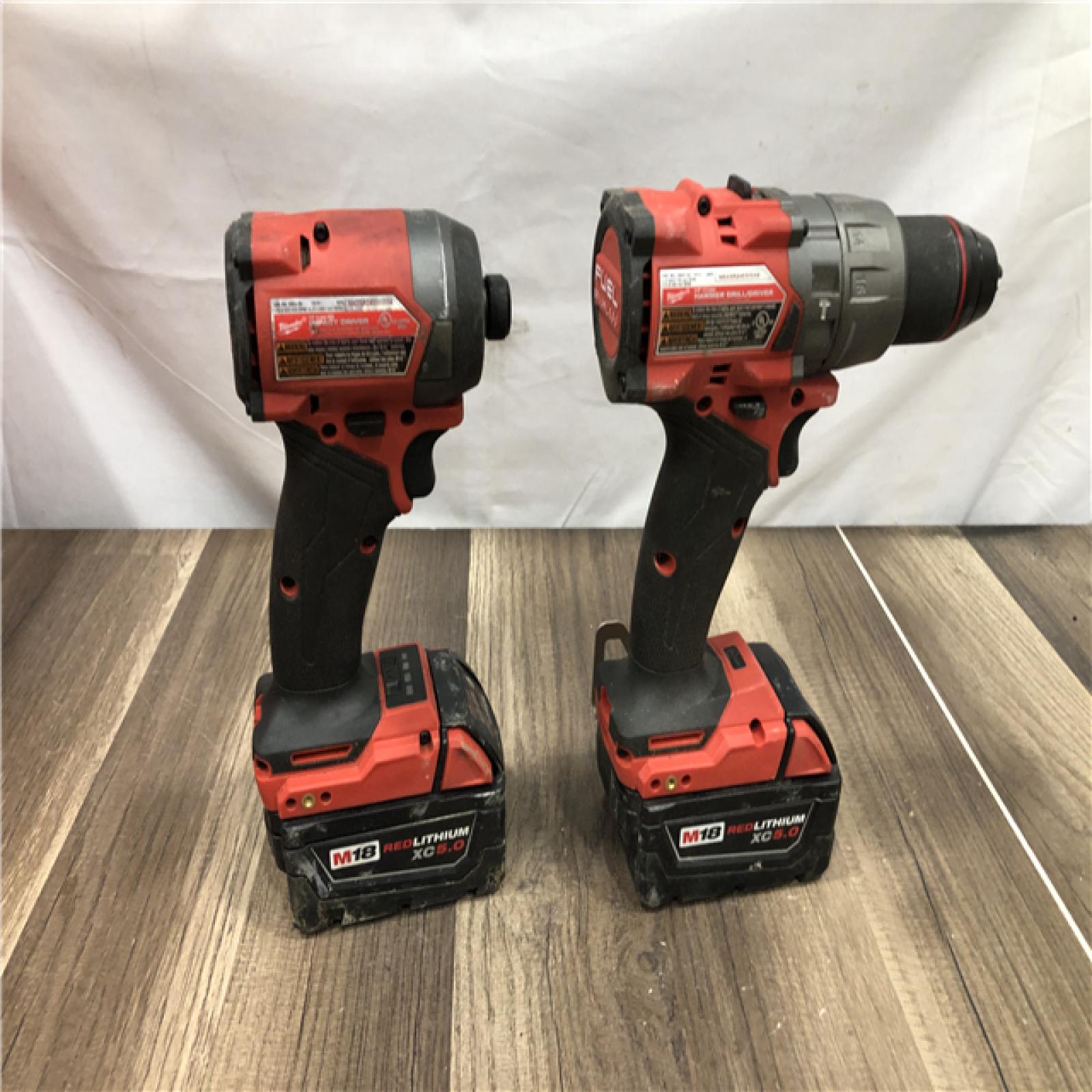 AS-IS Milwaukee FUEL 18V Lithium-Ion Brushless Cordless Hammer Drill and Impact Driver Combo Kit