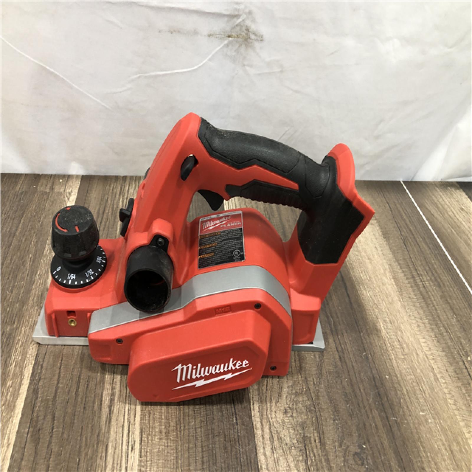 AS-IS Milwaukee M18 18V Lithium-Ion Cordless 3-1/4 in. Planer (Tool-Only)