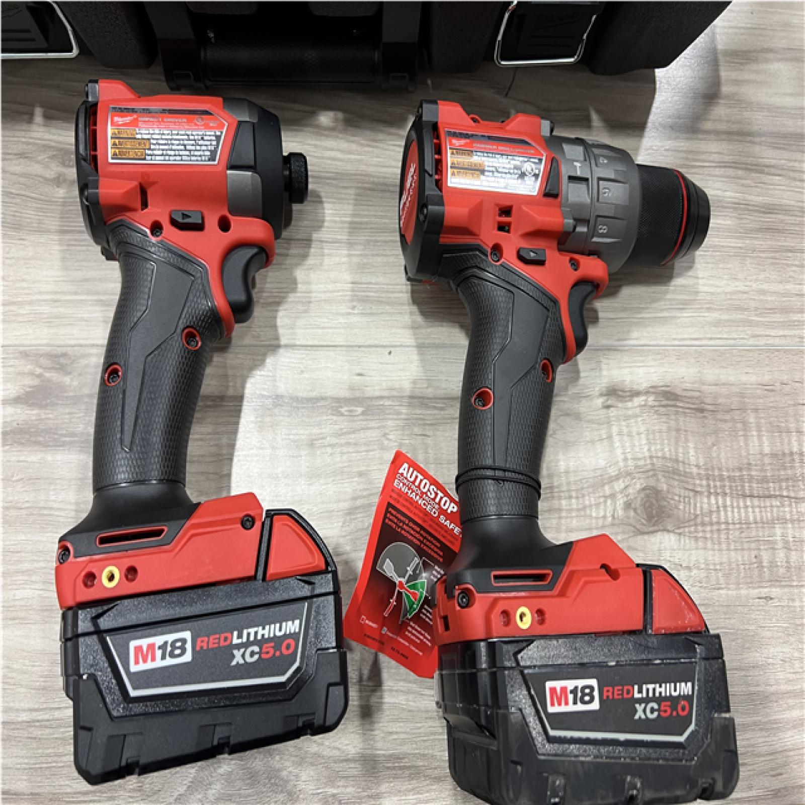 AS-IS Milwaukee FUEL 18V Lithium-Ion Brushless Cordless Hammer Drill and Impact Driver Combo Kit