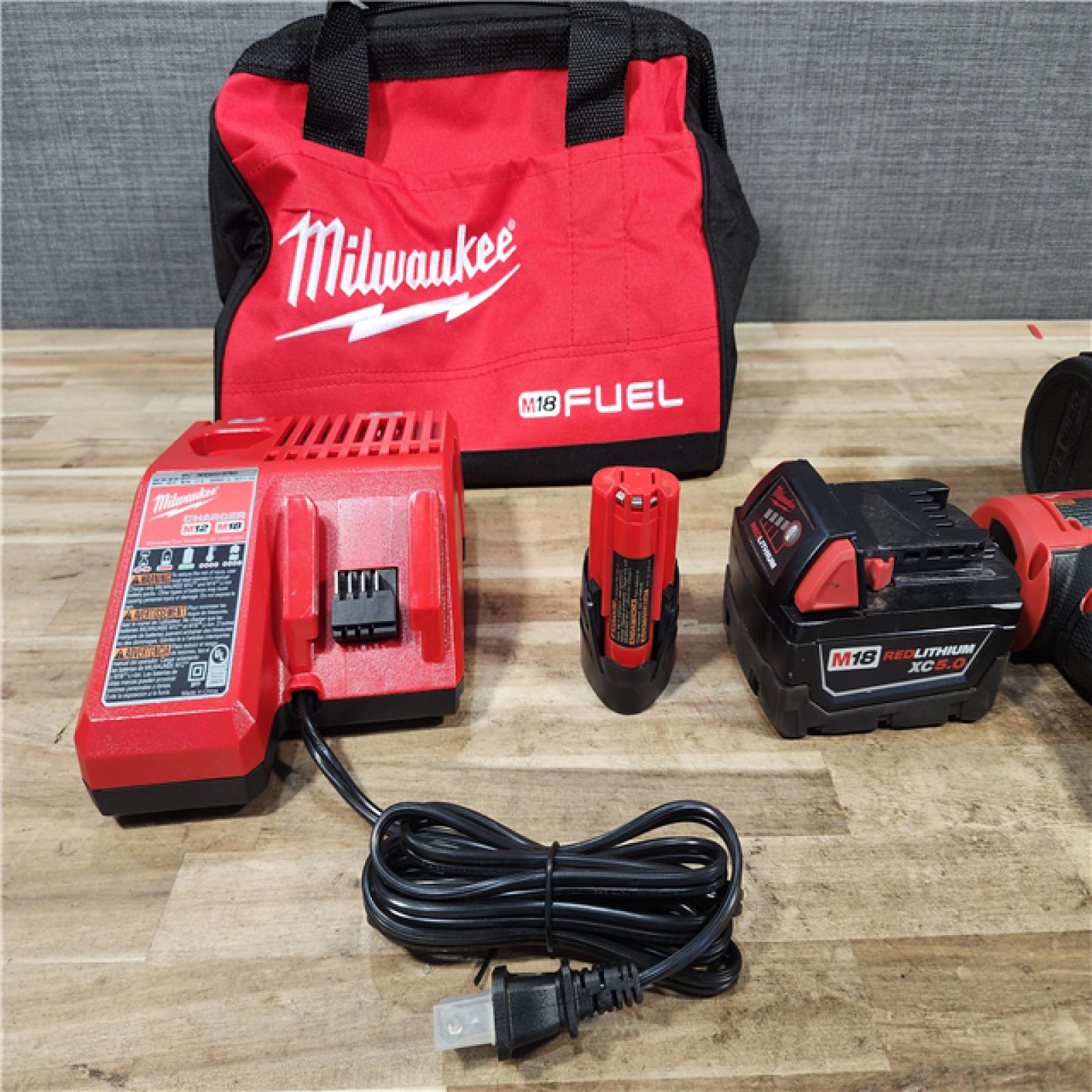 HOUSTON LOCATION - AS - IS Milwaukee 2 Tool Combo Kit W/ (2) Battery & Charger