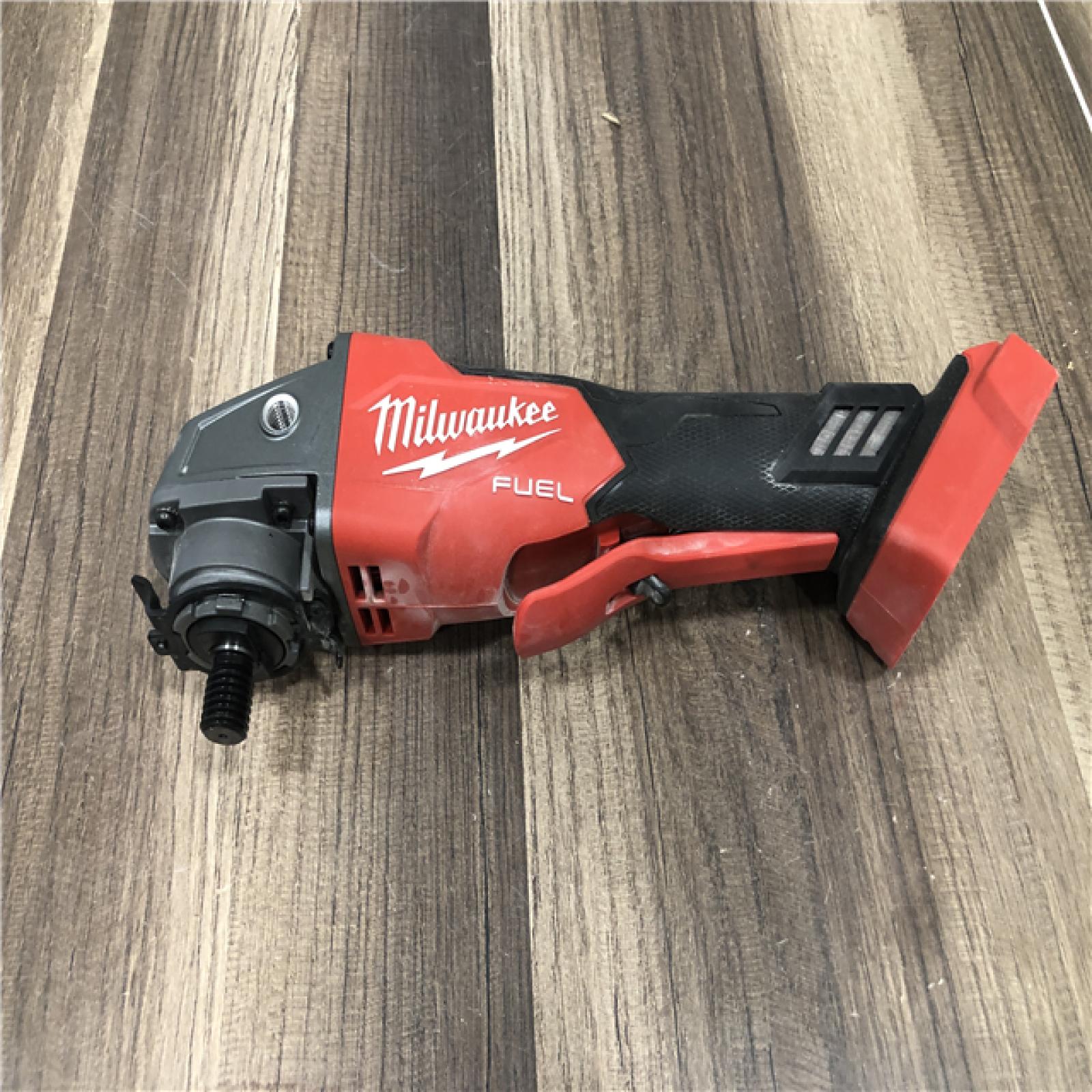AS-IS Milwaukee FUEL 18V Lithium-Ion Brushless Cordless 4-1/2 in./5 in. Grinder w/Paddle Switch (Tool-Only)