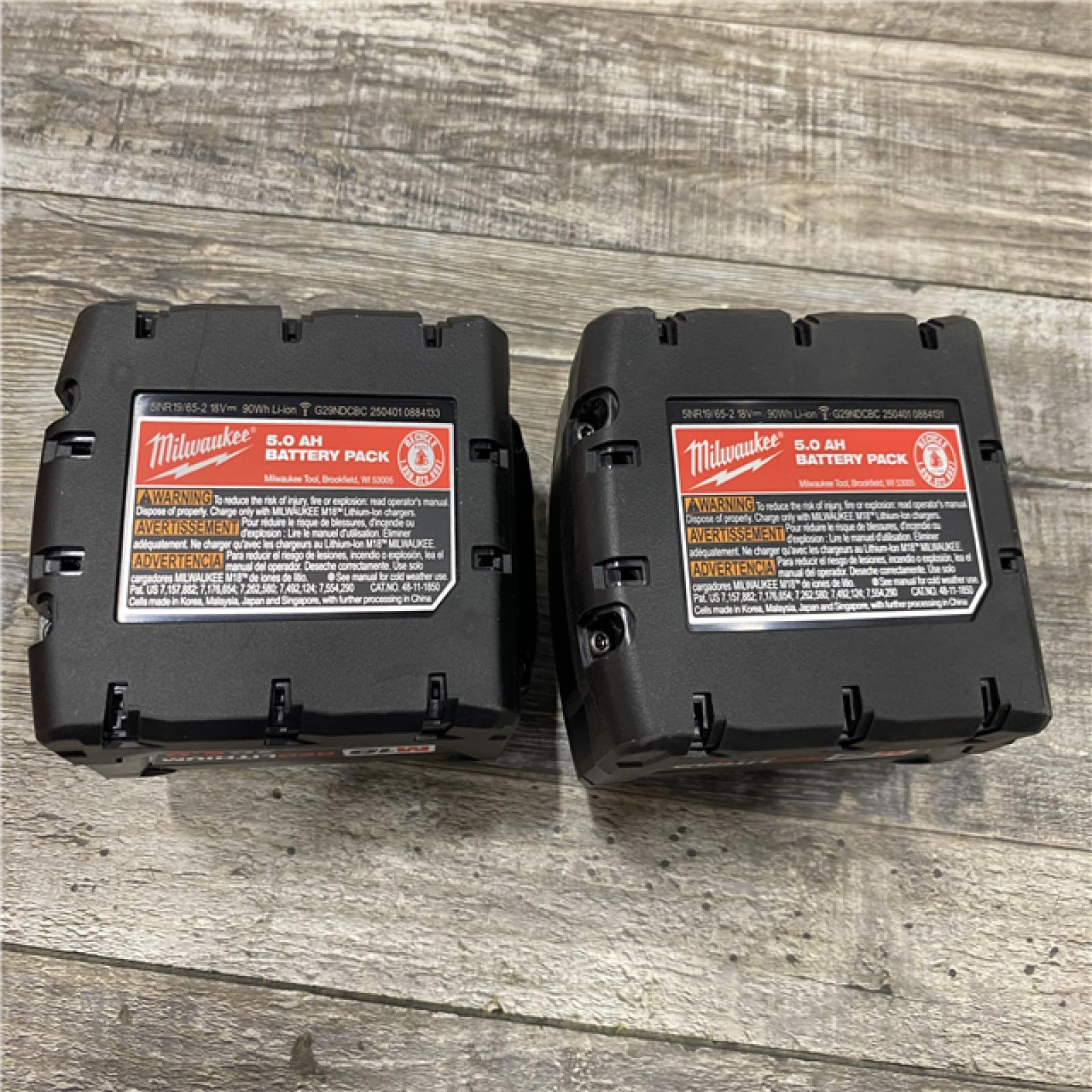 AS-IS Milwaukee 18-Volt Lithium-Ion XC Starter Kit with Two 5.0Ah Batteries and Charger