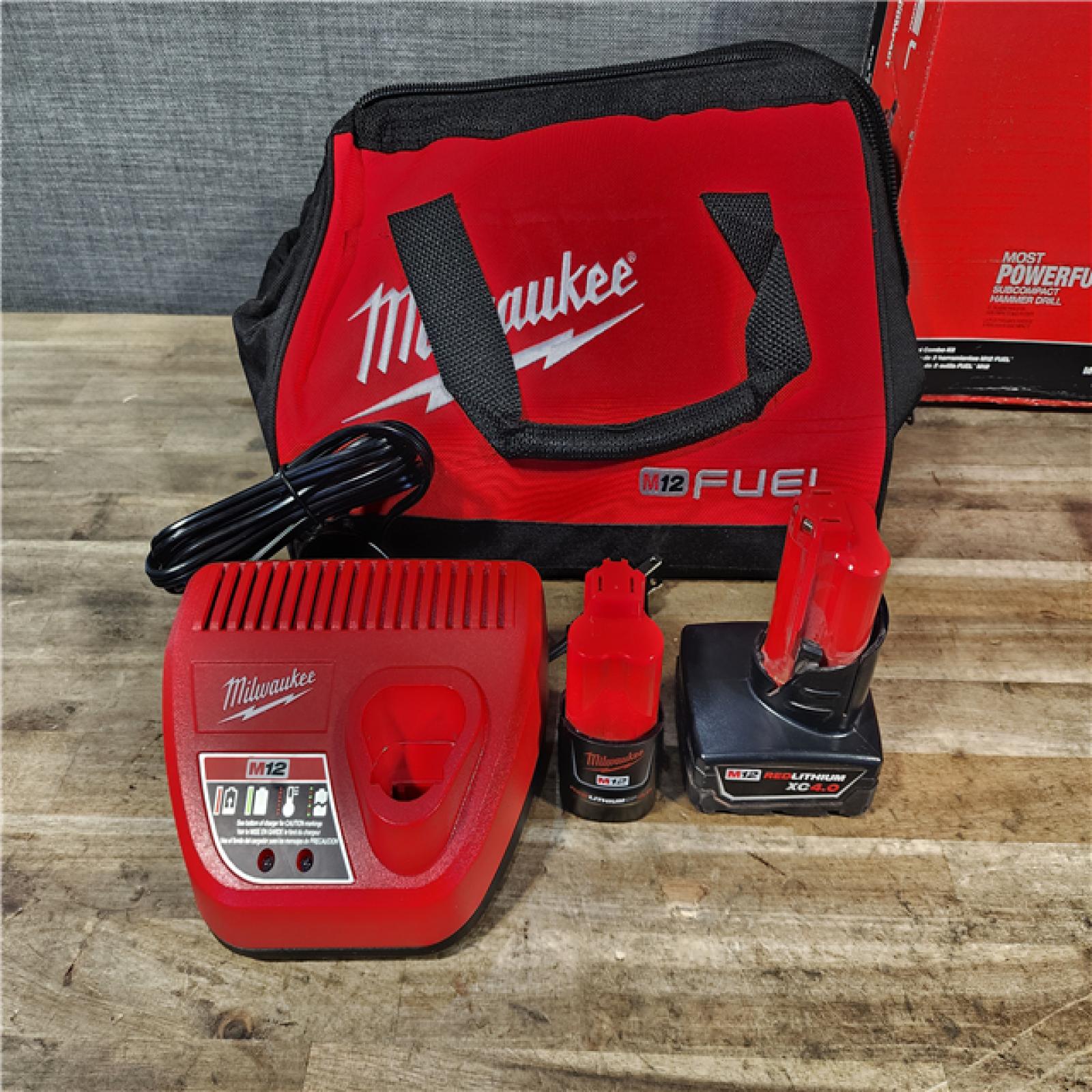 HOUSTON LOCATION - AS-IS Milwaukee FUEL 12-Volt Lithium-Ion Brushless Cordless Hammer Drill and Impact Driver Combo Kit