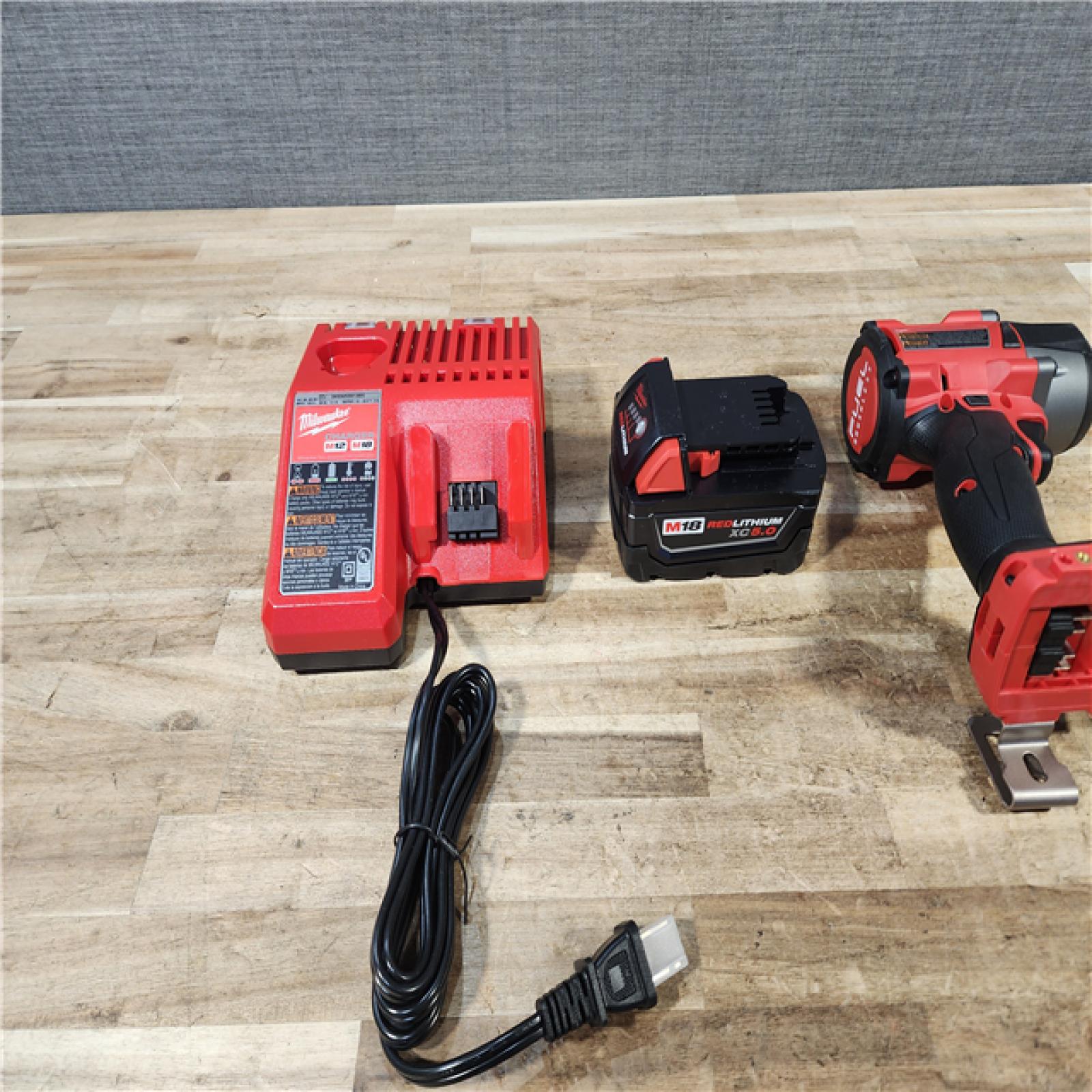 HOUSTON LOCATION - AS - IS Milwaukee M18 FUEL 1/2Inch Mid-Torque Impact Wrench w/ BATTERY & CHARGER