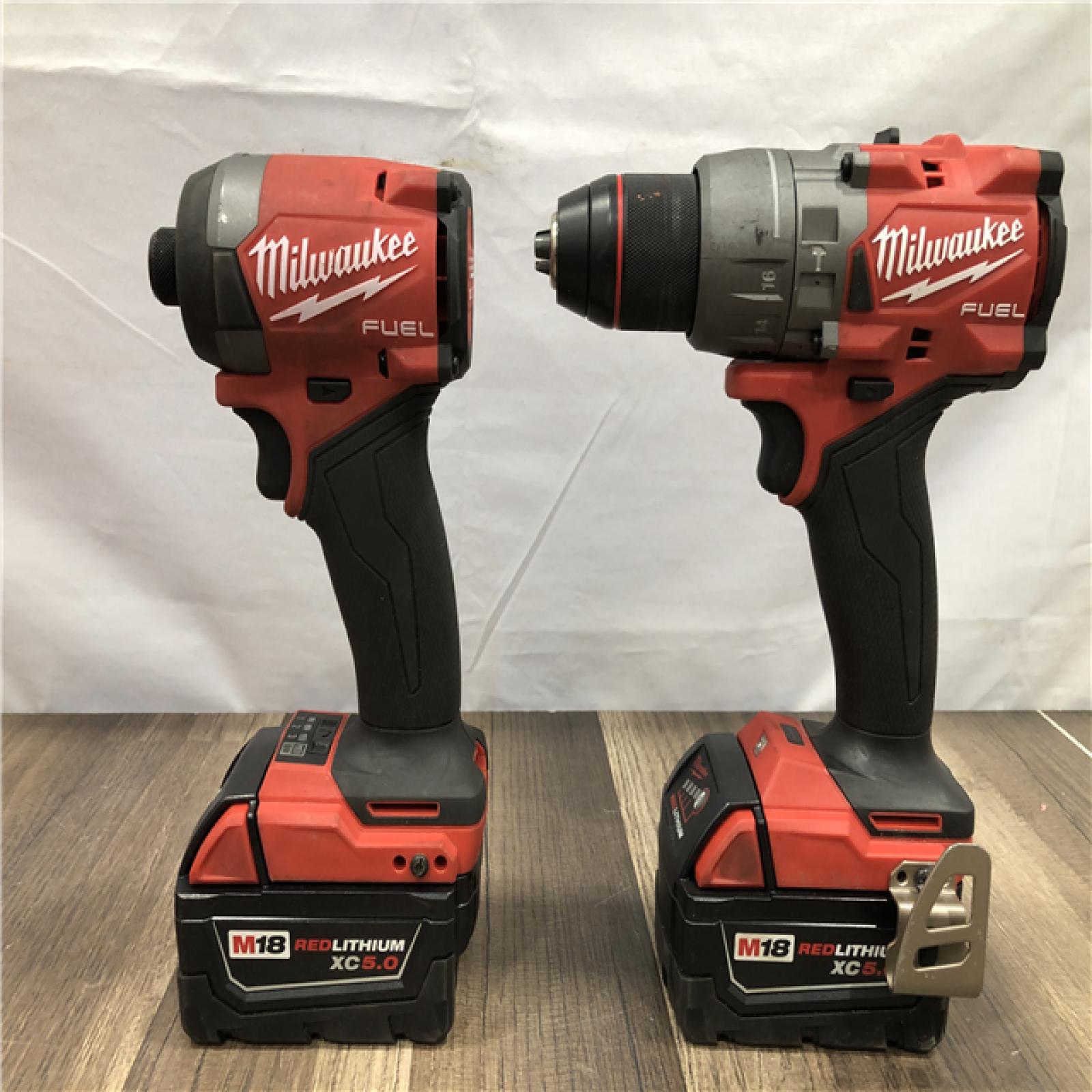 AS-IS Milwaukee FUEL 18V Lithium-Ion Brushless Cordless Hammer Drill and Impact Driver Combo Kit