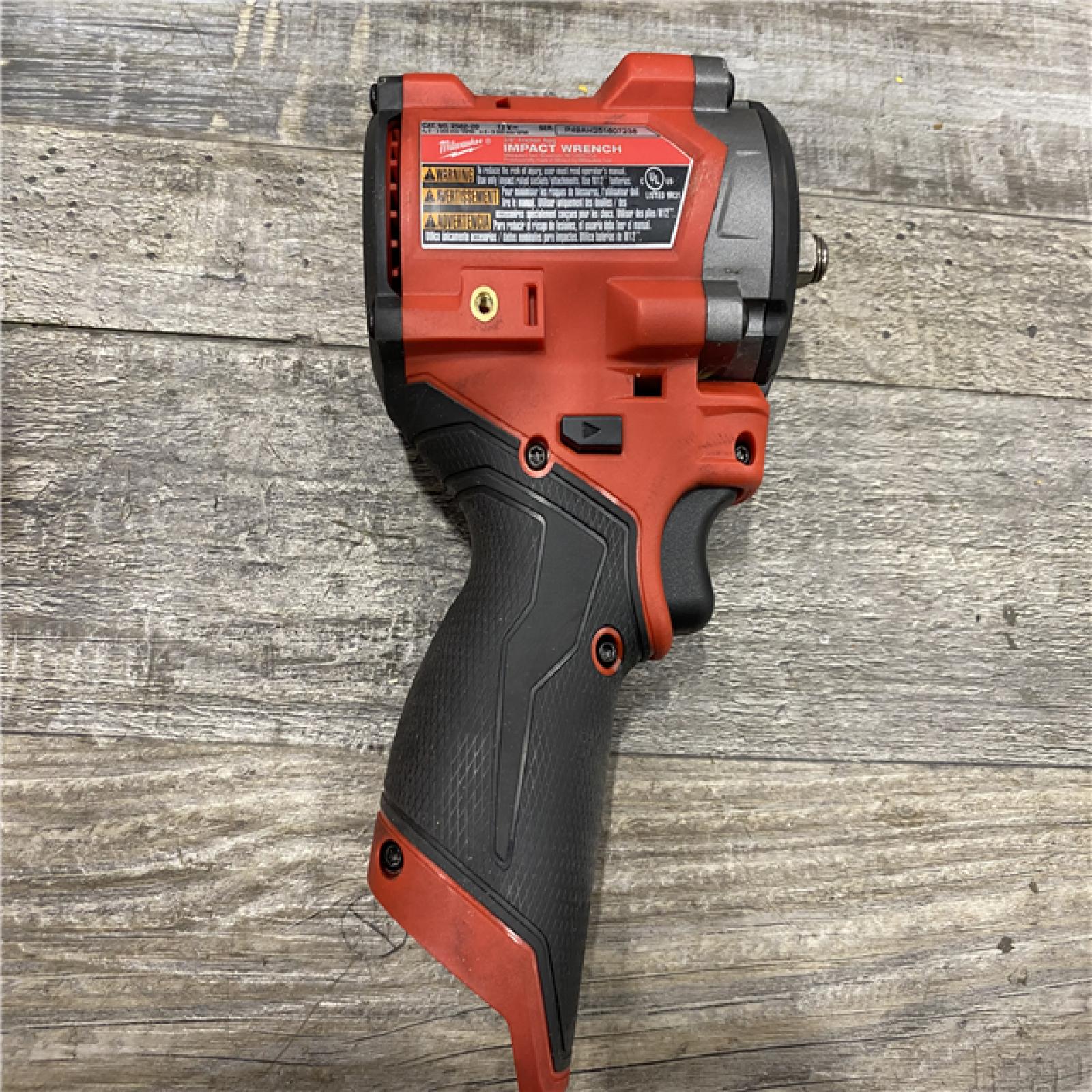 AS-IS Milwaukee FUEL 12V Lithium-Ion Brushless Cordless Stubby 3/8 in. Impact Wrench (Tool-Only)