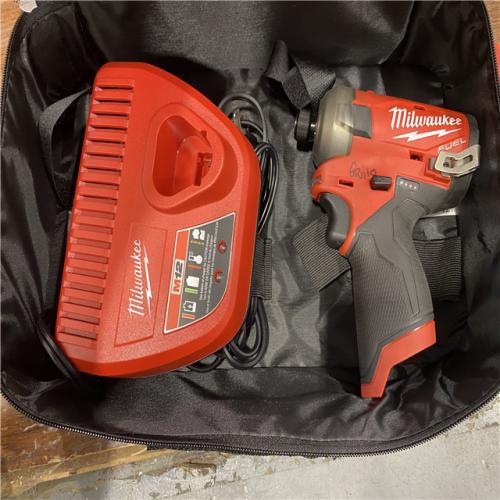 AS-IS M12 FUEL SURGE 12V Lithium-Ion Brushless Cordless 1/4 in. Hex Impact Driver Compact Kit W/Two 2.0Ah Batteries, Bag