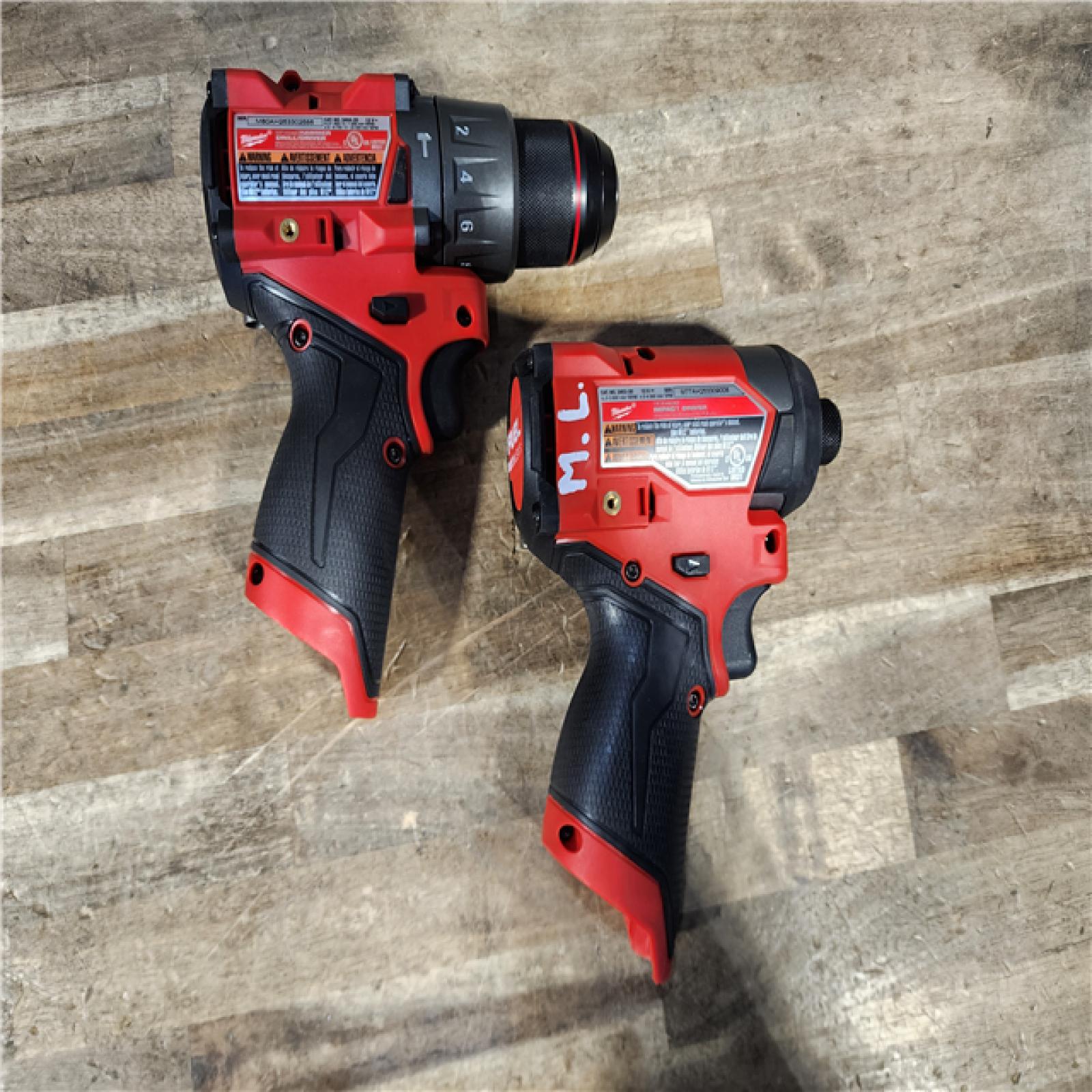 HOUSTON LOCATION - AS-IS Milwaukee FUEL 12-Volt Lithium-Ion Brushless Cordless Hammer Drill and Impact Driver Combo Kit