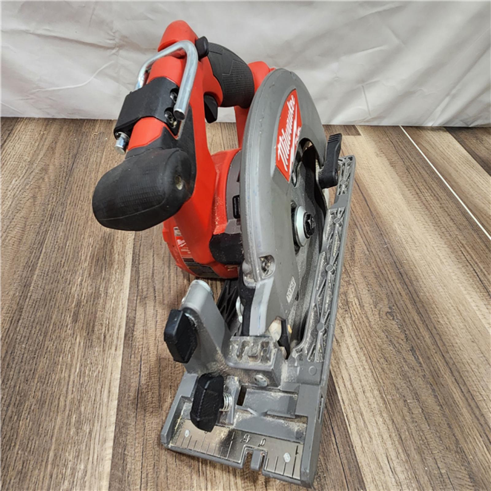 AS-IS Milwaukee M18 FUEL 18V Lithium-Ion Brushless Cordless 6-1/2 in. Circular Saw (Tool-Only)