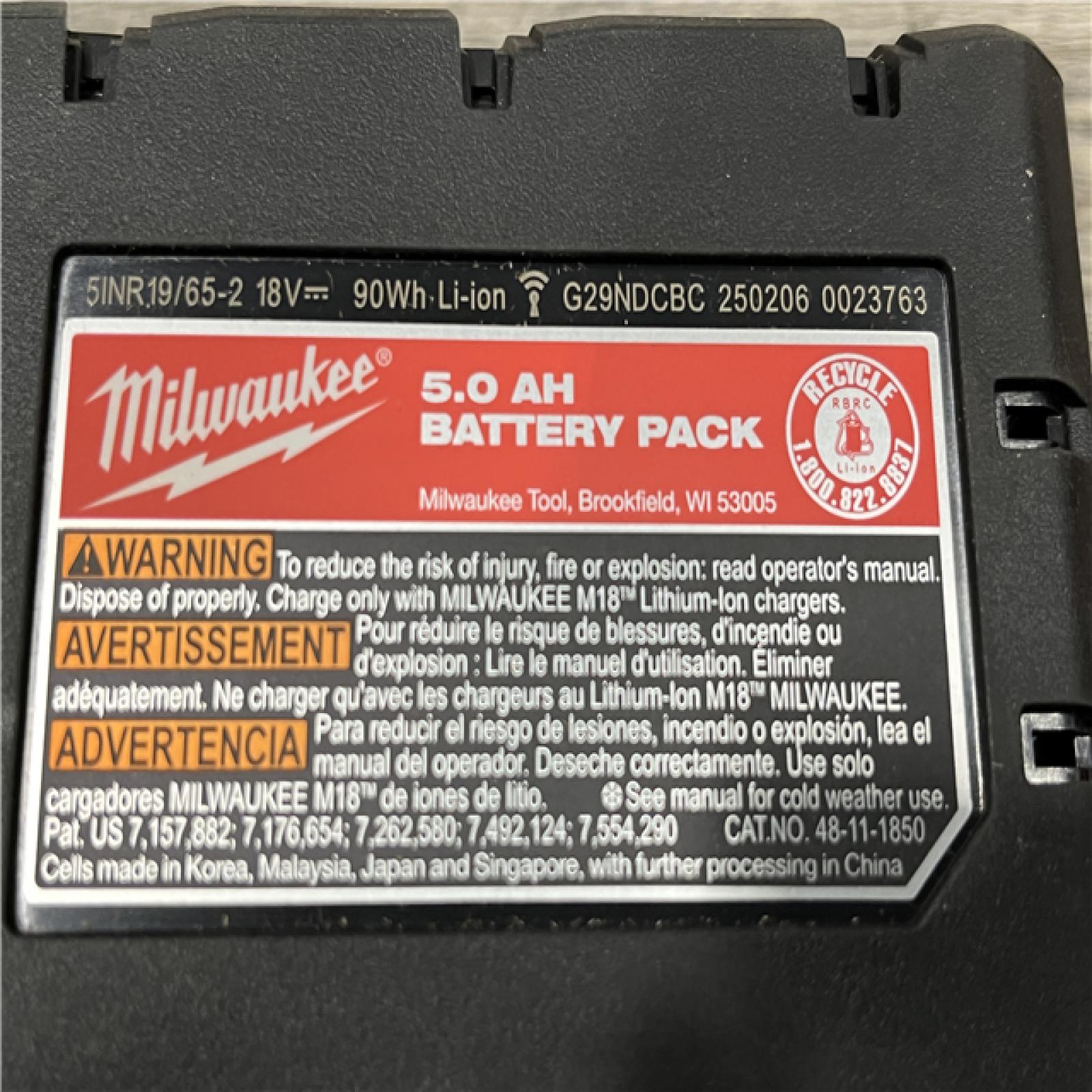 AS-IS Milwaukee 18-Volt Lithium-Ion XC Starter Kit with (2) 5.0Ah Batteries and Charger