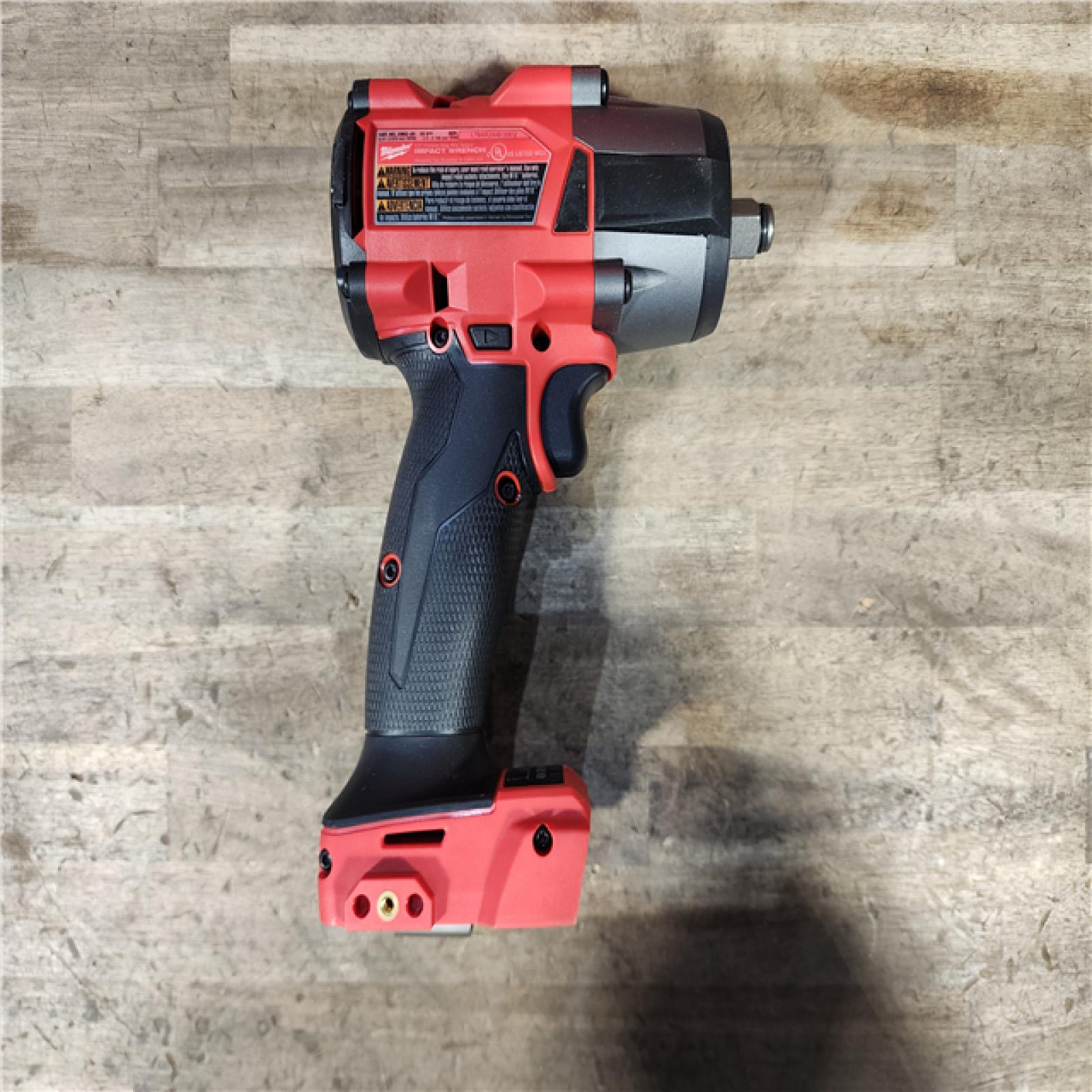 HOUSTON LOCATION - AS-IS (APPEARS LIKE NEW) Milwaukee 2962-20 M18 18V Fuel 1/2 Mid-Torque Impact Wrench Cordless Lithium-Ion Brushless (Tool-Only)