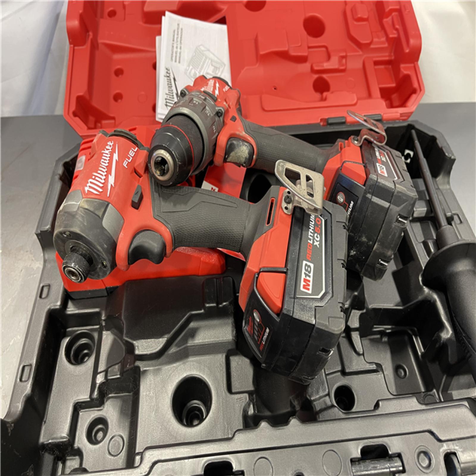 AS-IS - MILWAUKEE FUEL 18V Lithium-Ion Brushless Cordless Hammer Drill and Impact Driver Combo Kit