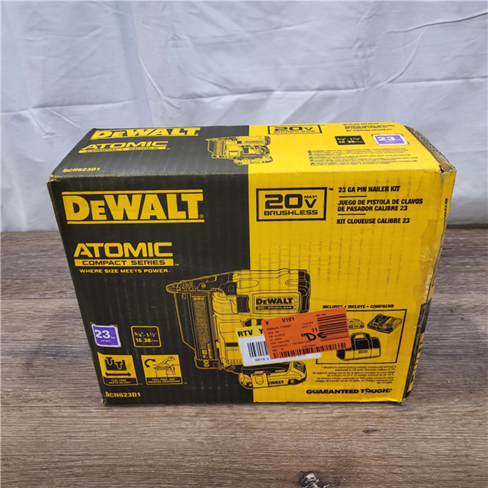 AS-IS DEWALT ATOMIC 20V MAX Lithium Ion Cordless 23 Gauge Pin Nailer Kit with 2.0Ah Battery and Charger