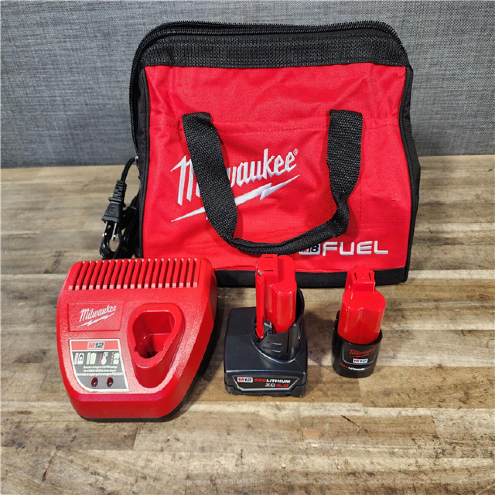 HOUSTON LOCATION - AS-IS Milwaukee FUEL 12-Volt Lithium-Ion Brushless Cordless Hammer Drill and Impact Driver Combo Kit