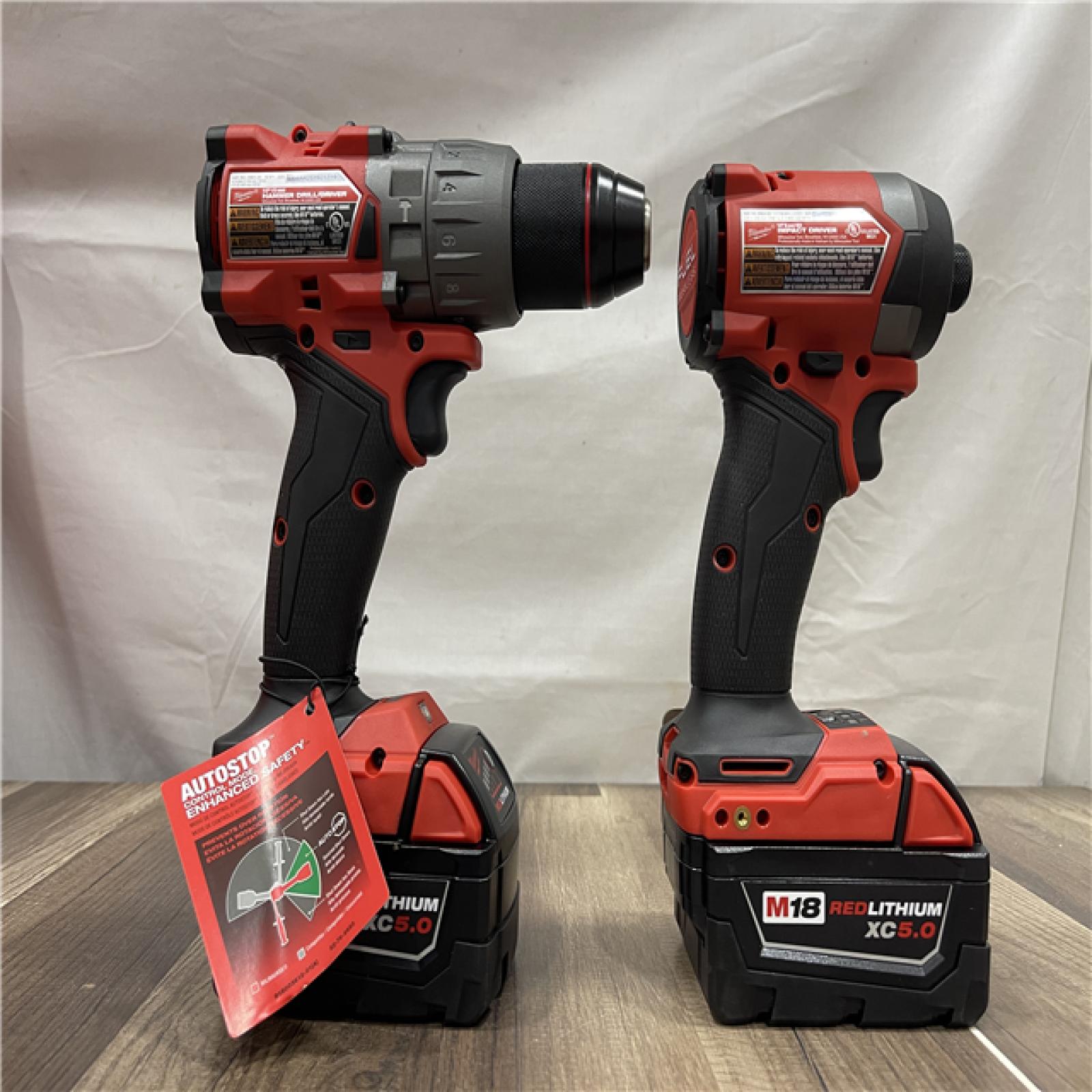 AS-IS Milwaukee FUEL 18V Lithium-Ion Brushless Cordless Hammer Drill and Impact Driver Combo Kit