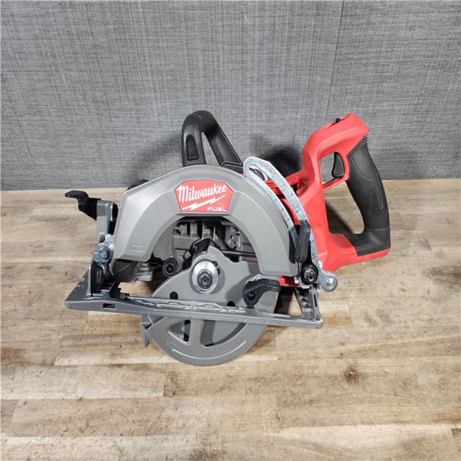 HOUSTON LOCATION - AS-IS MILWAUKEE 7-1/4 REAR HANDLE CIRCULAR SAW (TOOL ONLY)