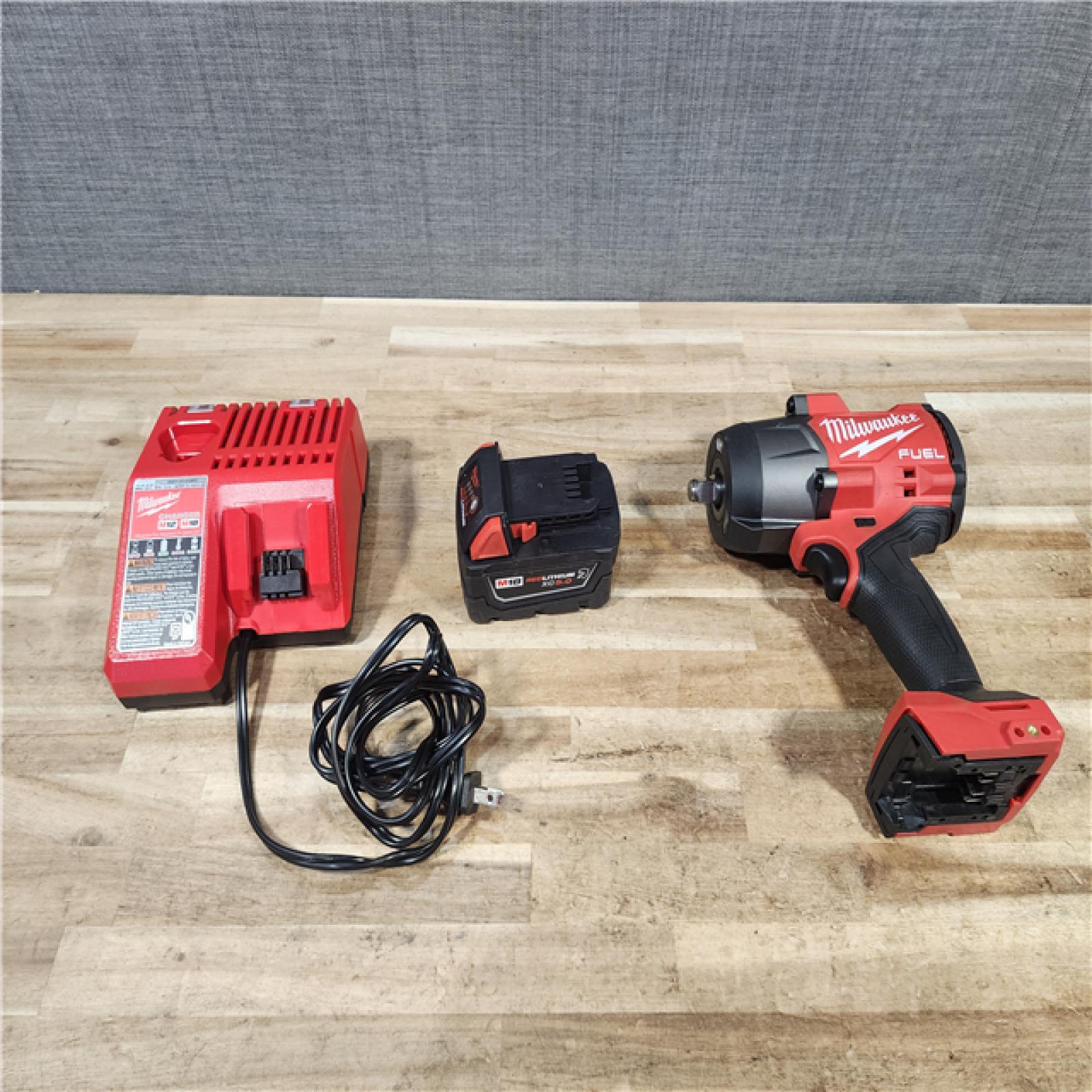 HOUSTON LOCATION - AS - IS Milwaukee FUEL 18V Lithium-Ion Brushless Cordless 1/2 in. Impact Wrench with Friction Ring W/ BATTERY & CHARGER