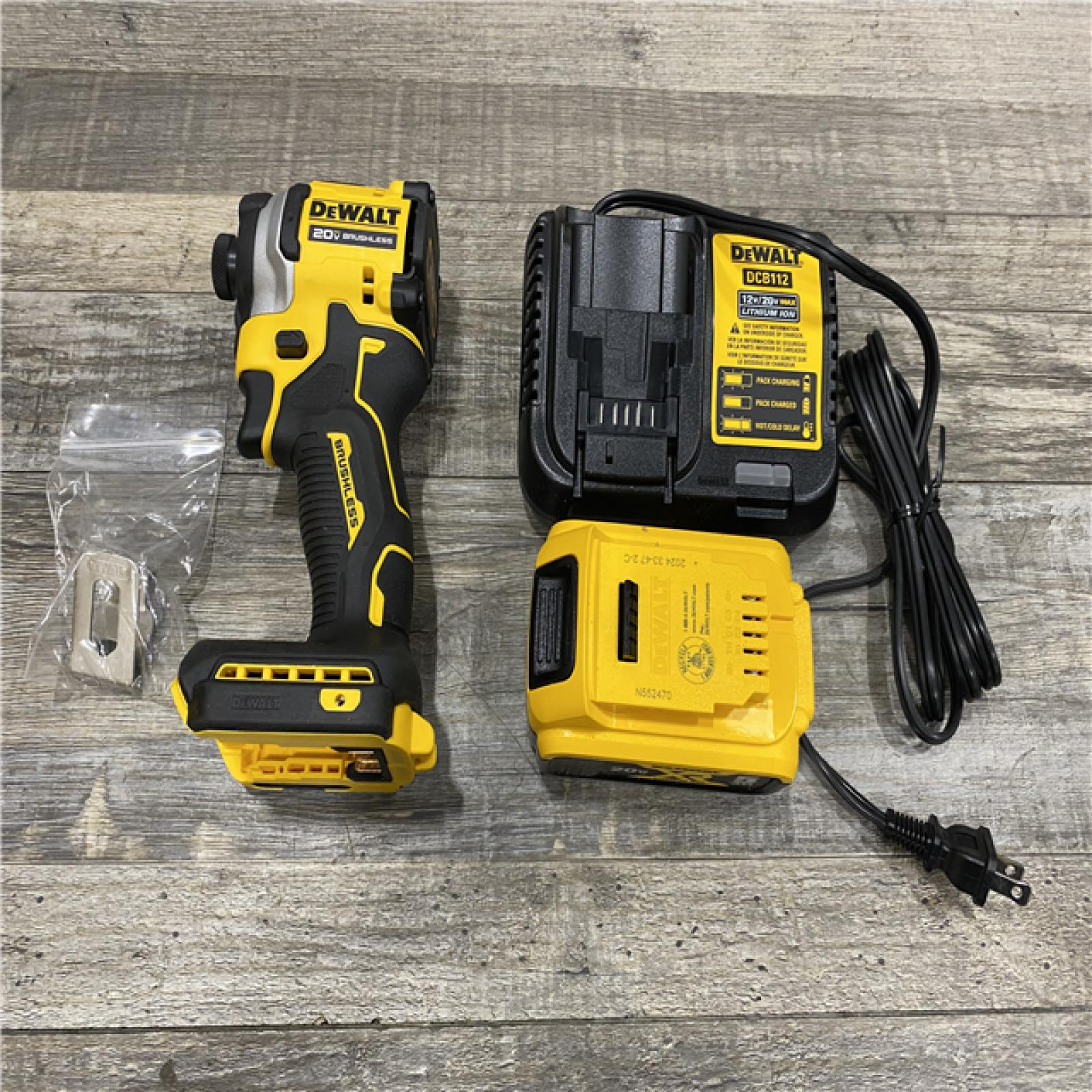 AS-IS DEWALT ATOMIC 20V MAX Lithium-Ion Cordless 1/4 in. Brushless Impact Driver Kit