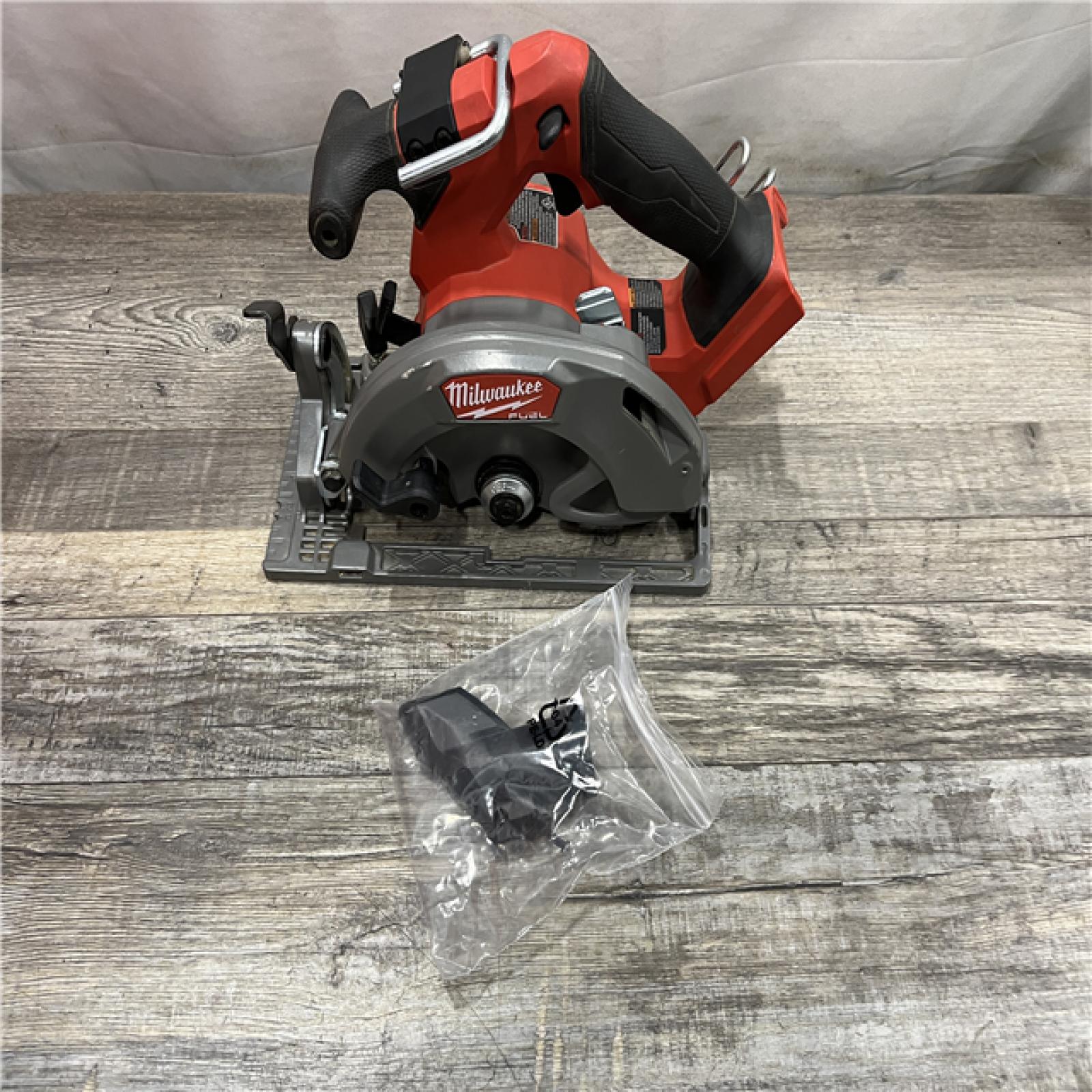 AS-IS Milwaukee FUEL 18V Lithium-Ion Brushless Cordless 6-1/2 in. Circular Saw (Tool-Only)