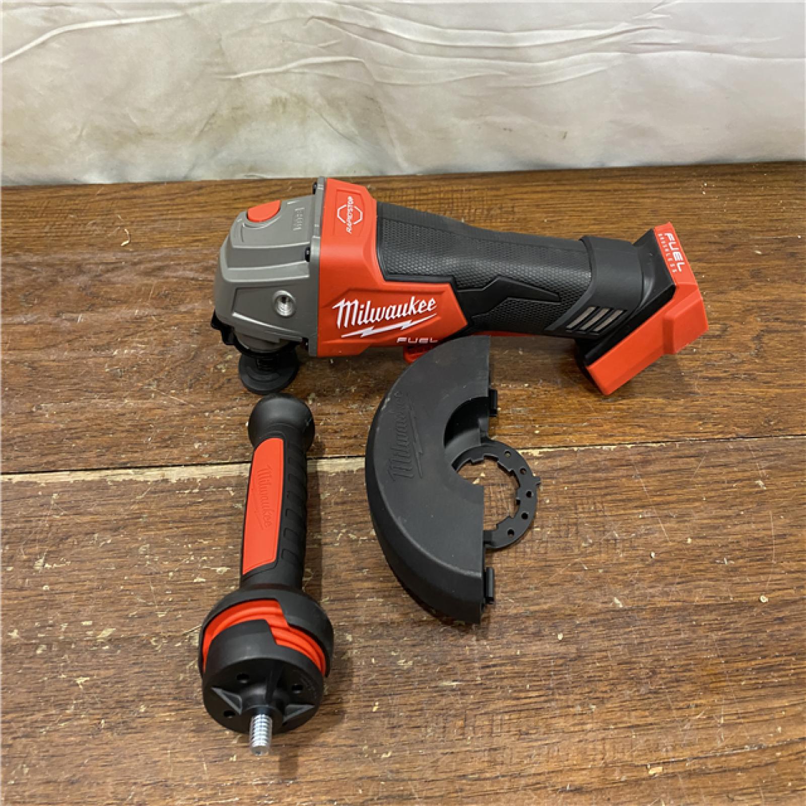 AS-IS Milwaukee 2880-20 FUEL 18-Volt Lithium-Ion Brushless Cordless 4-1/2 in./5 in. Grinder W/Paddle Switch (Tool-Only)