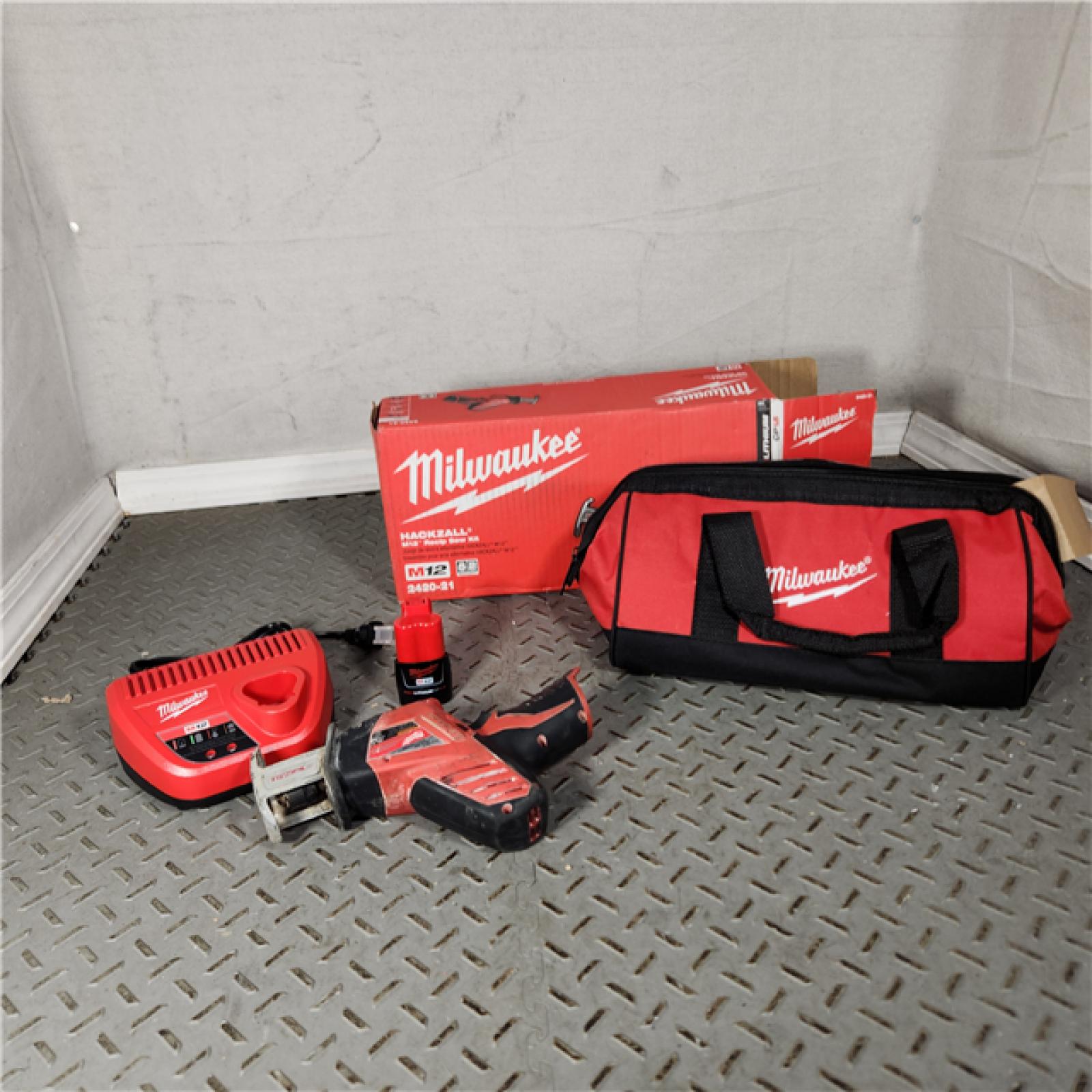 Houston Location - As-Is Milwaukee 2420-21 - M12 Fuel Hackzall 1/2  12V 1.5Ah Cordless Straight Handle Reciprocating Saw Kit - Appears IN USED Condition
