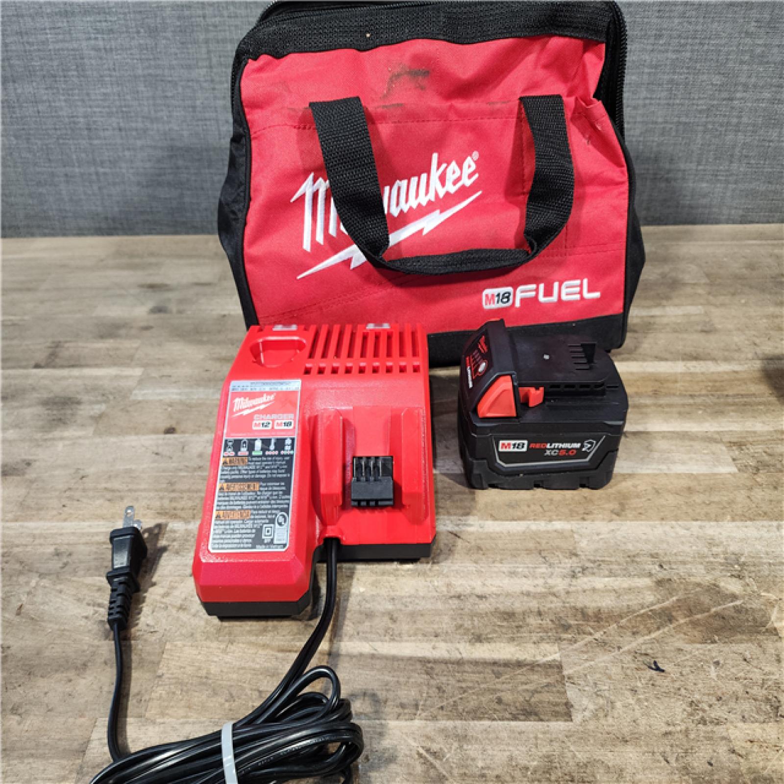 HOUSTON LOCATION - AS-IS Milwaukee M18 1/2 in. Cordless Brushless High Torque Impact Wrench Kit (Battery & Charger)