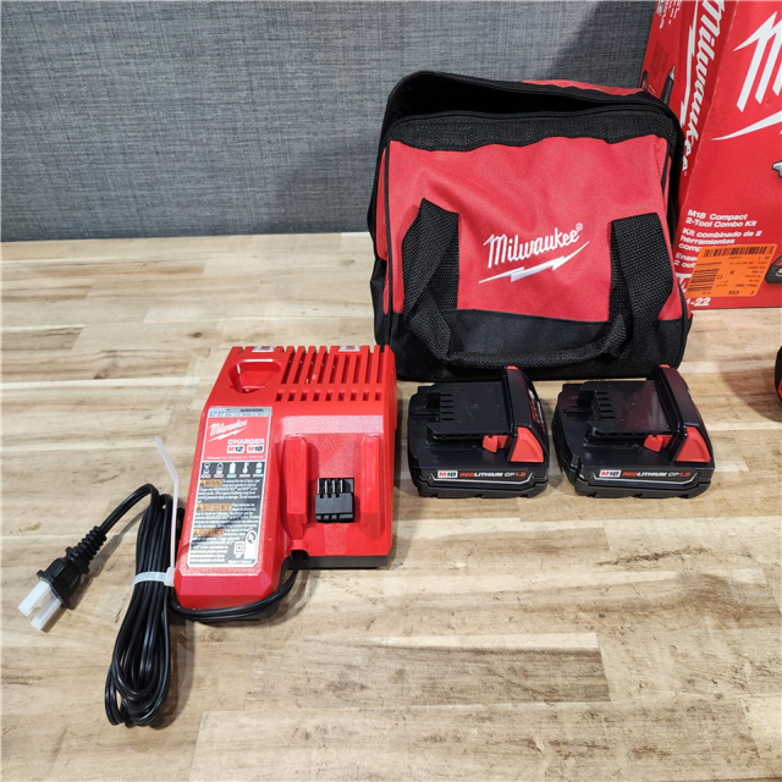 HOUSTON LOCATION - AS-IS Milwaukee 18V Lithium-Ion Cordless Drill Driver/Impact Driver Combo Kit