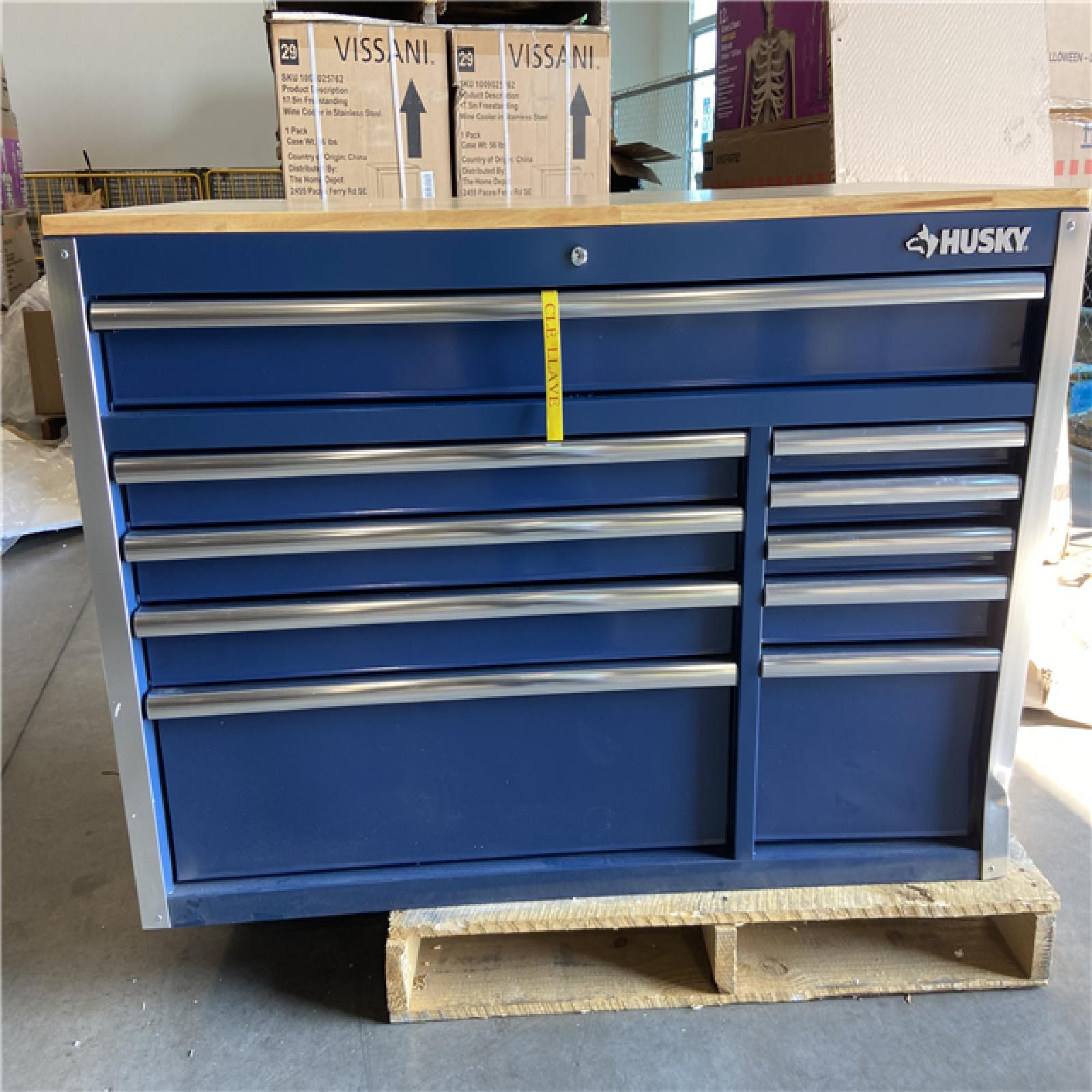DALLAS LOCATION - Husky 52 in. W x 25 in. D 10-Drawer Mobile Workbench Tool Chest with Solid Wood Work Top in Gloss Blue