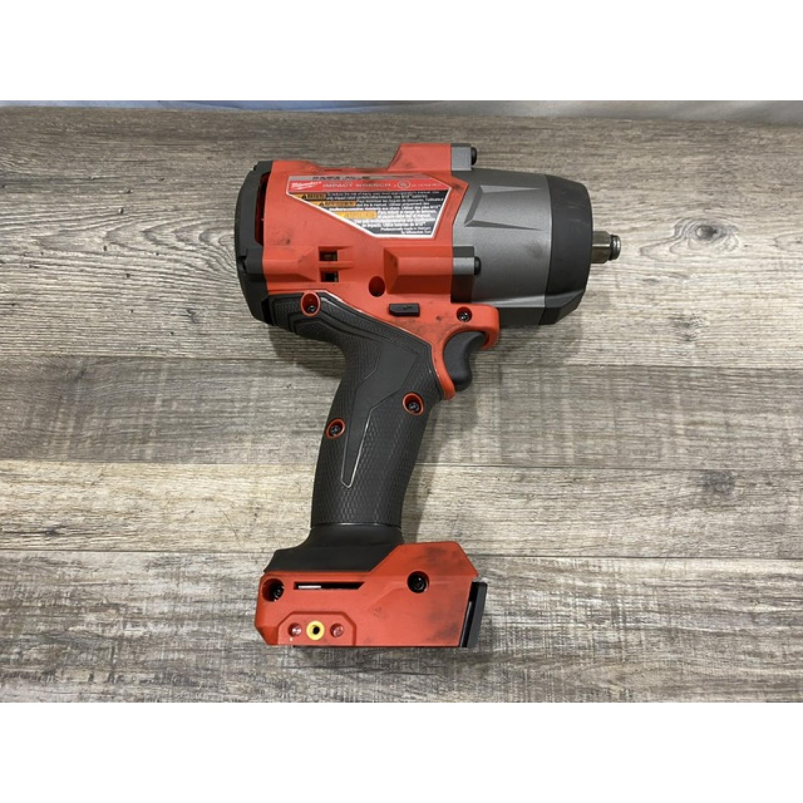 AS-IS Milwaukee FUEL 18V Lithium-Ion Brushless Cordless 1/2 in. Impact Wrench w/Friction Ring Kit