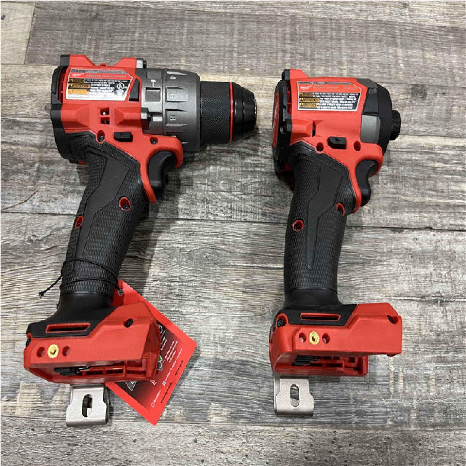AS-IS Milwaukee FUEL 18V Lithium-Ion Brushless Cordless Hammer Drill and Impact Driver Combo Kit