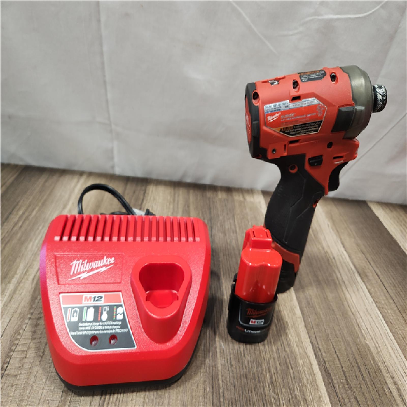 AS-IS- Milwaukee M12 FUEL SURGE 12V Lithium-Ion Brushless Cordless 1/4 in. Hex Impact Driver Compact Kit W/Two 2.0Ah Batteries  Bag