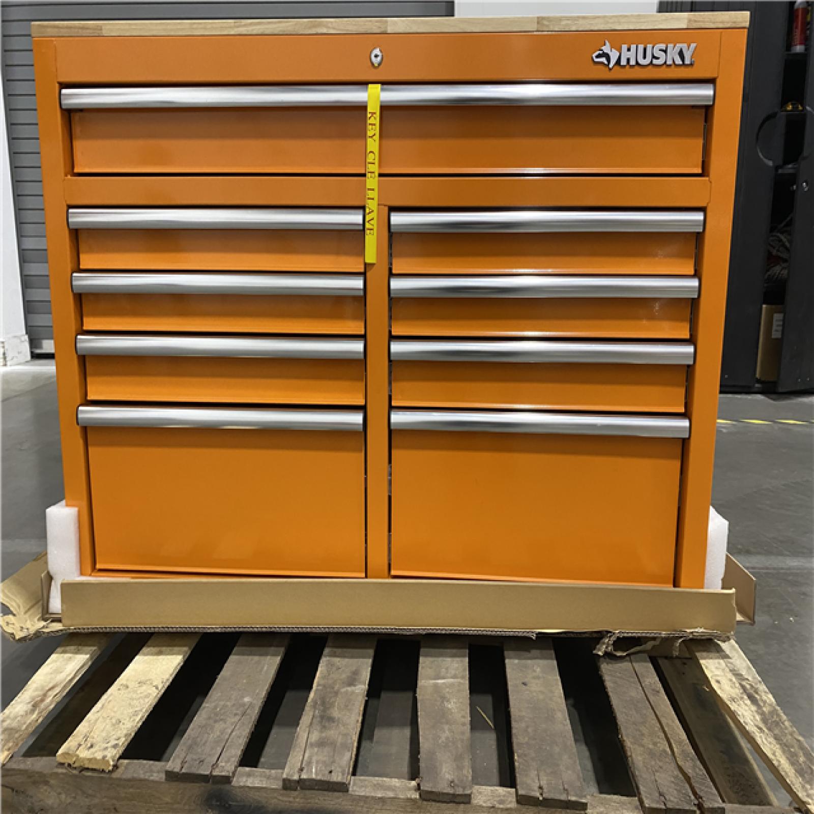 DALLAS LOCATION - Husky 46 in. W x 18 in. D 9-Drawer Gloss Orange Mobile Workbench Cabinet with Solid Wood Top