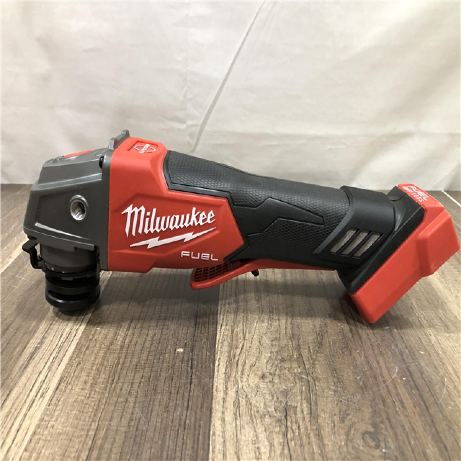 AS-IS Milwaukee FUEL 18V Lithium-Ion Brushless Cordless 4-1/2 in./5 in. Grinder w/Paddle Switch (Tool-Only)