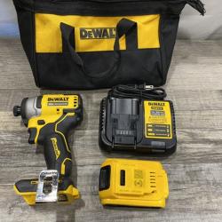 AS-IS DEWALT Atomic 20V Max Lithium-Ion Brushless Cordless Compact 1/4 in. Impact Driver Kit