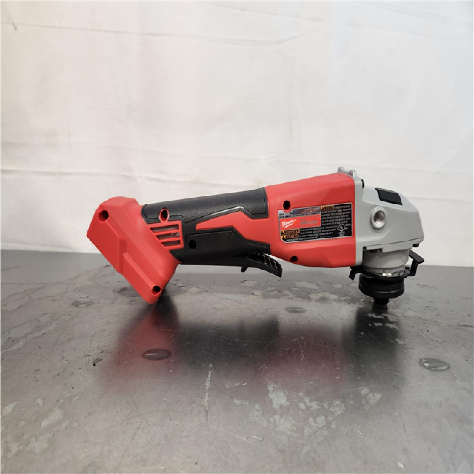AS-IS- Milwaukee 18V Cordless 4.5 /5  Grinder W/ Paddle Switch (Tool Only)