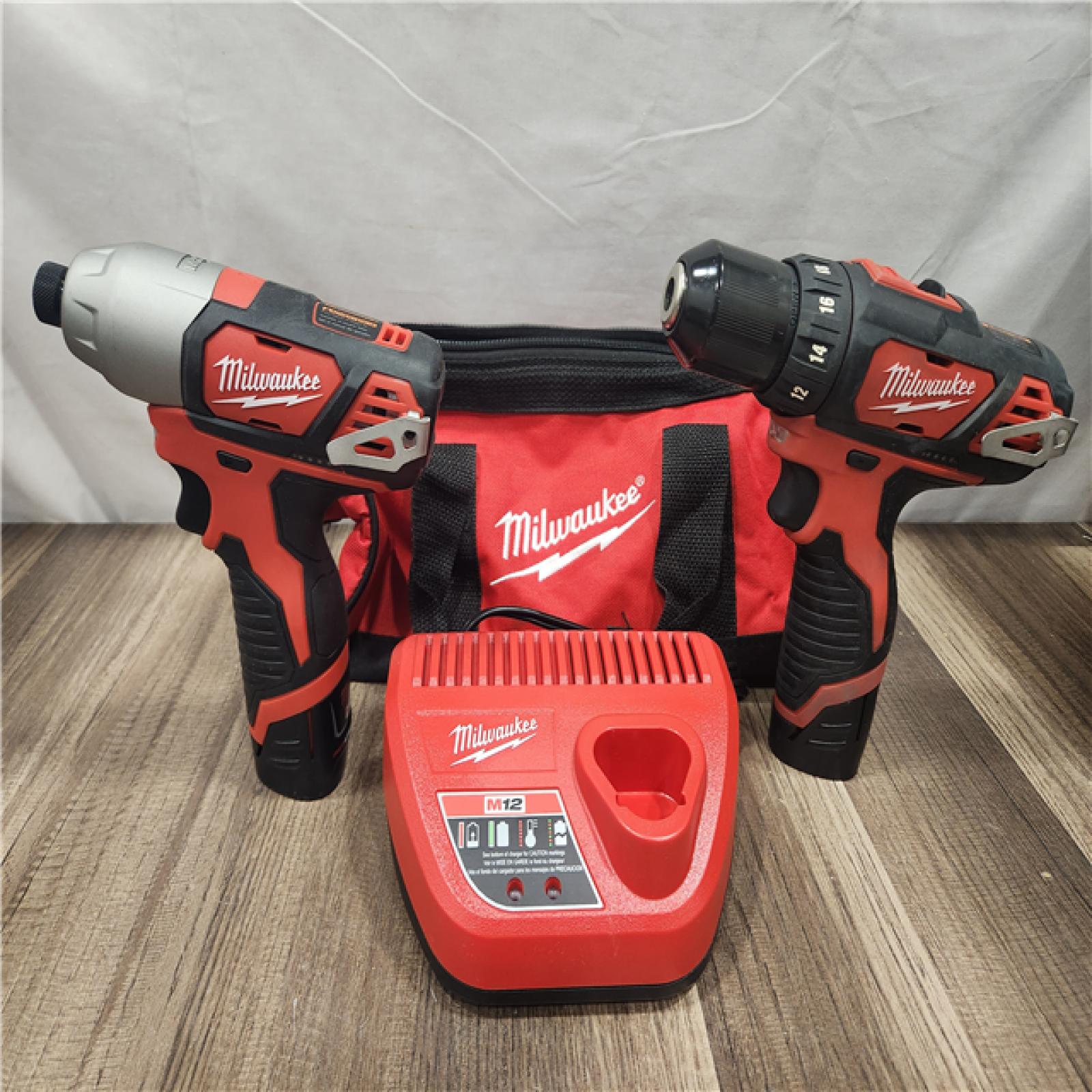 AS-IS- Milwaukee M12 Cordless Combination 3/8  Drill / Driver and 1/4  Hex Impact Driver Dual Power Tool Kit (2 Lithium Ion Batteries  Charger  and B