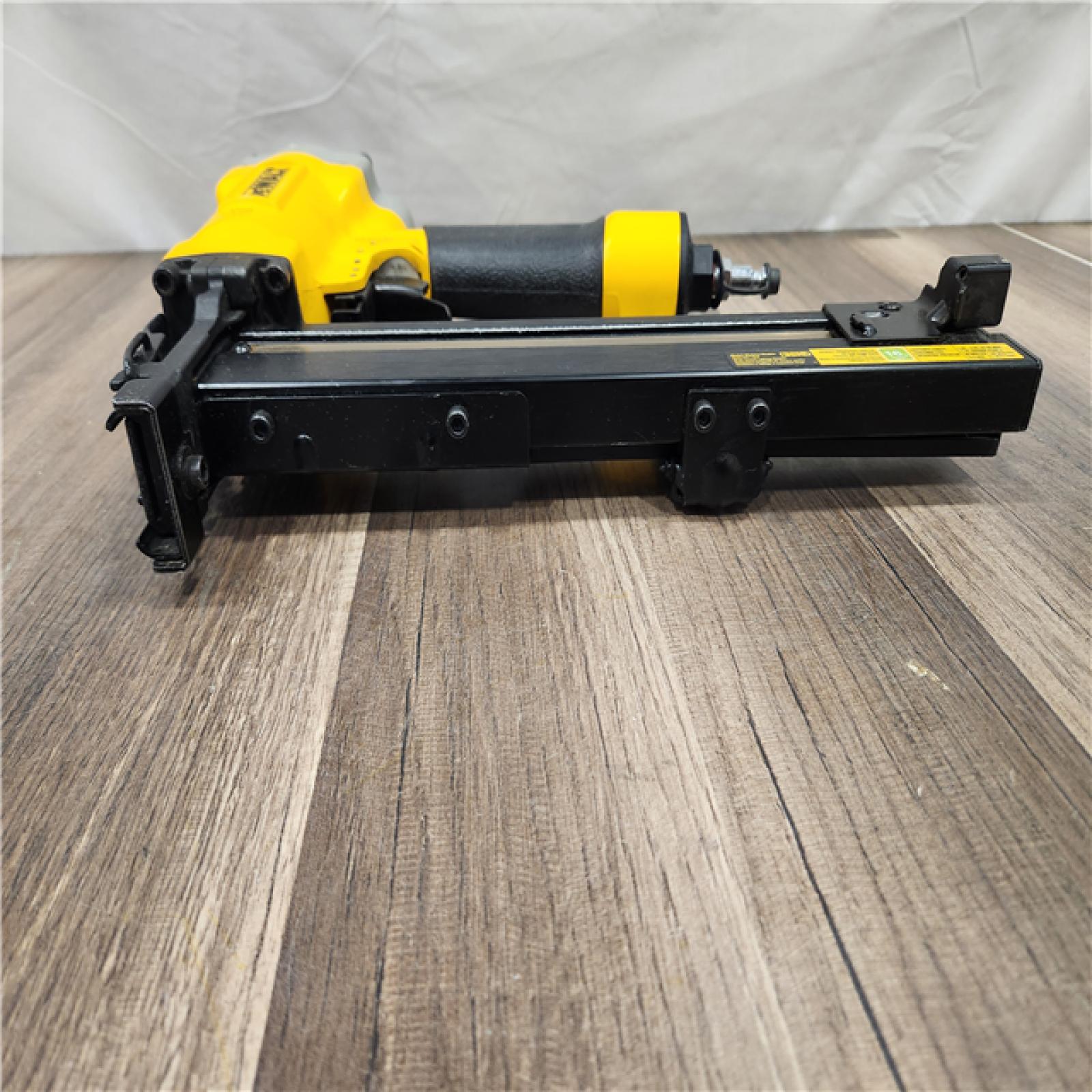 AS-IS  DEWALT Corded Pneumatic 16-Gauge 1 in. Crown Lathing Stapler