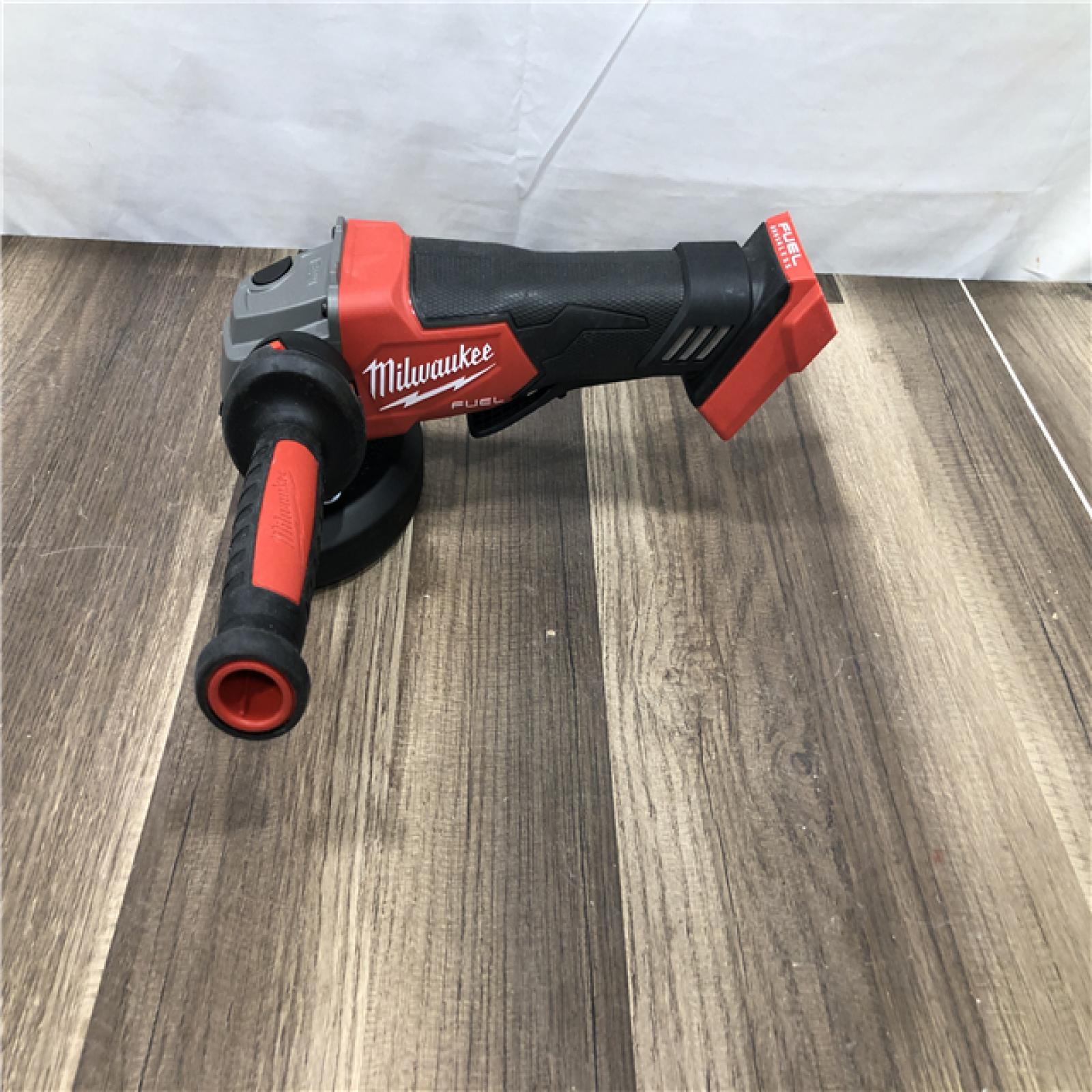 AS-IS Milwaukee FUEL 18V Lithium-Ion Brushless Cordless 4-1/2 in./5 in. Grinder w/Paddle Switch (Tool-Only)