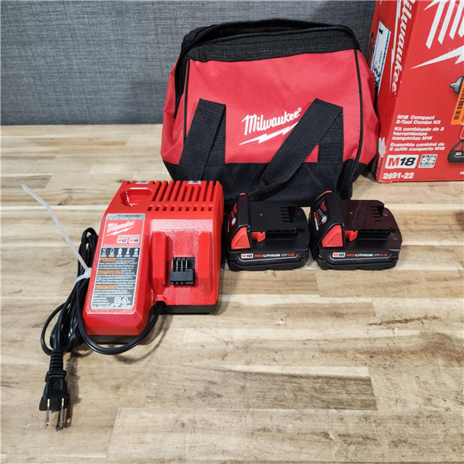 HOUSTON LOCATION - AS-IS Milwaukee 18V Lithium-Ion Cordless Drill Driver/Impact Driver Combo Kit
