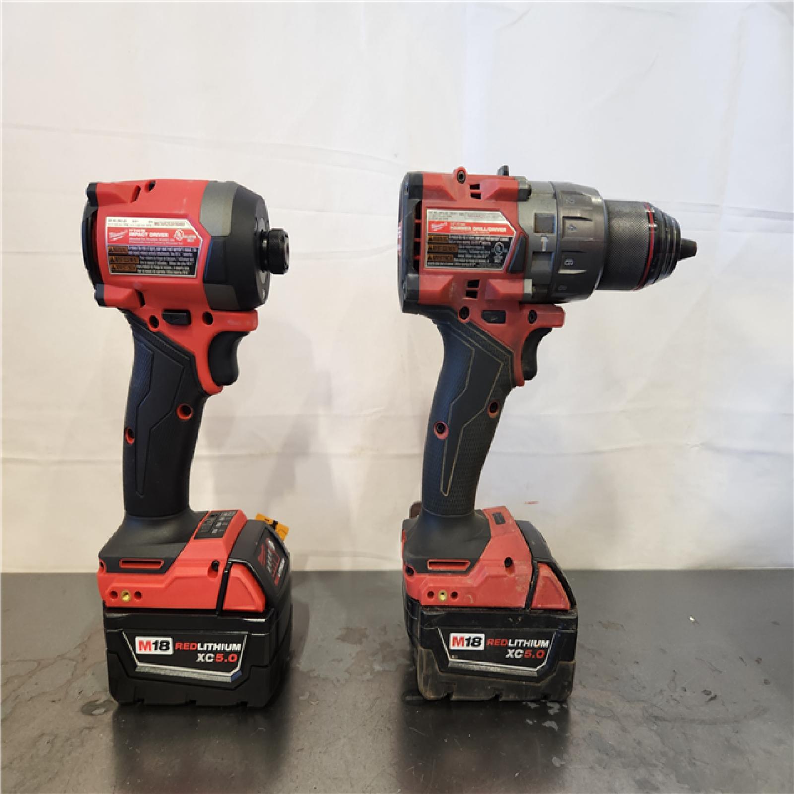 AS-IS- Milwaukee FUEL 18V Lithium-Ion Brushless Cordless Hammer Drill and Impact Driver Combo Kit