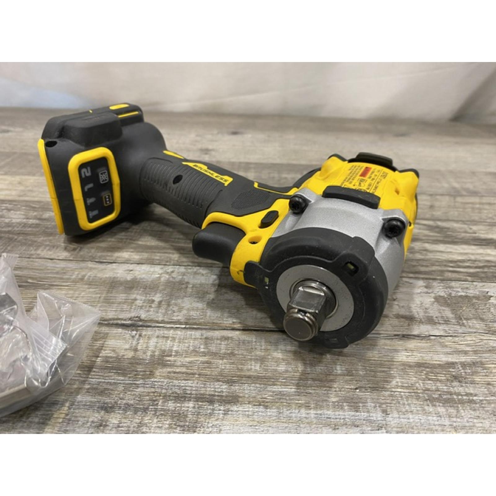 AS-IS DEWALT ATOMIC 20V MAX Cordless Brushless 1/2 in. Variable Speed Impact Wrench (Tool Only)